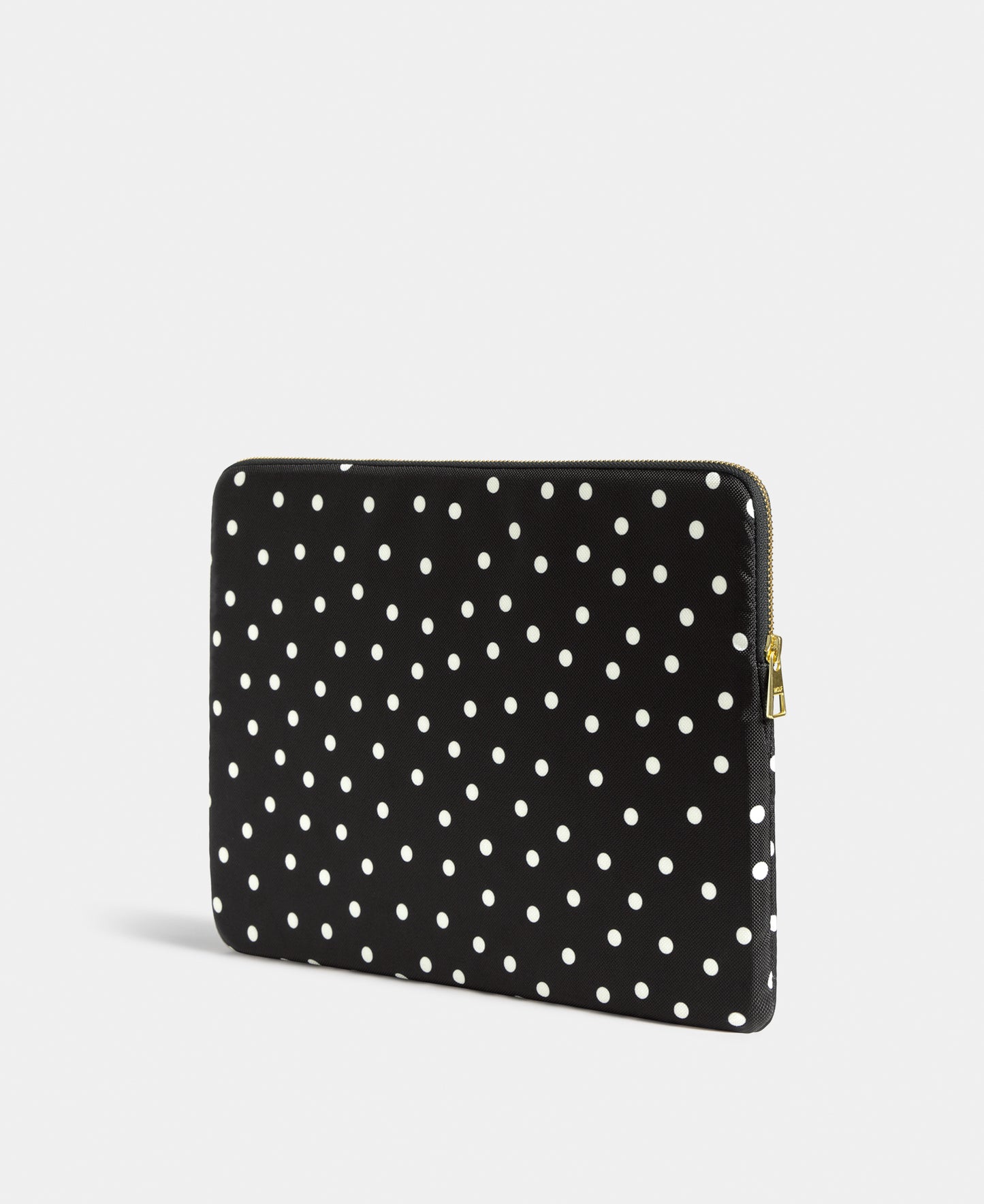 Back view of the Grace 13-14 laptop sleeve with white polka dot print on a black background - Wouf