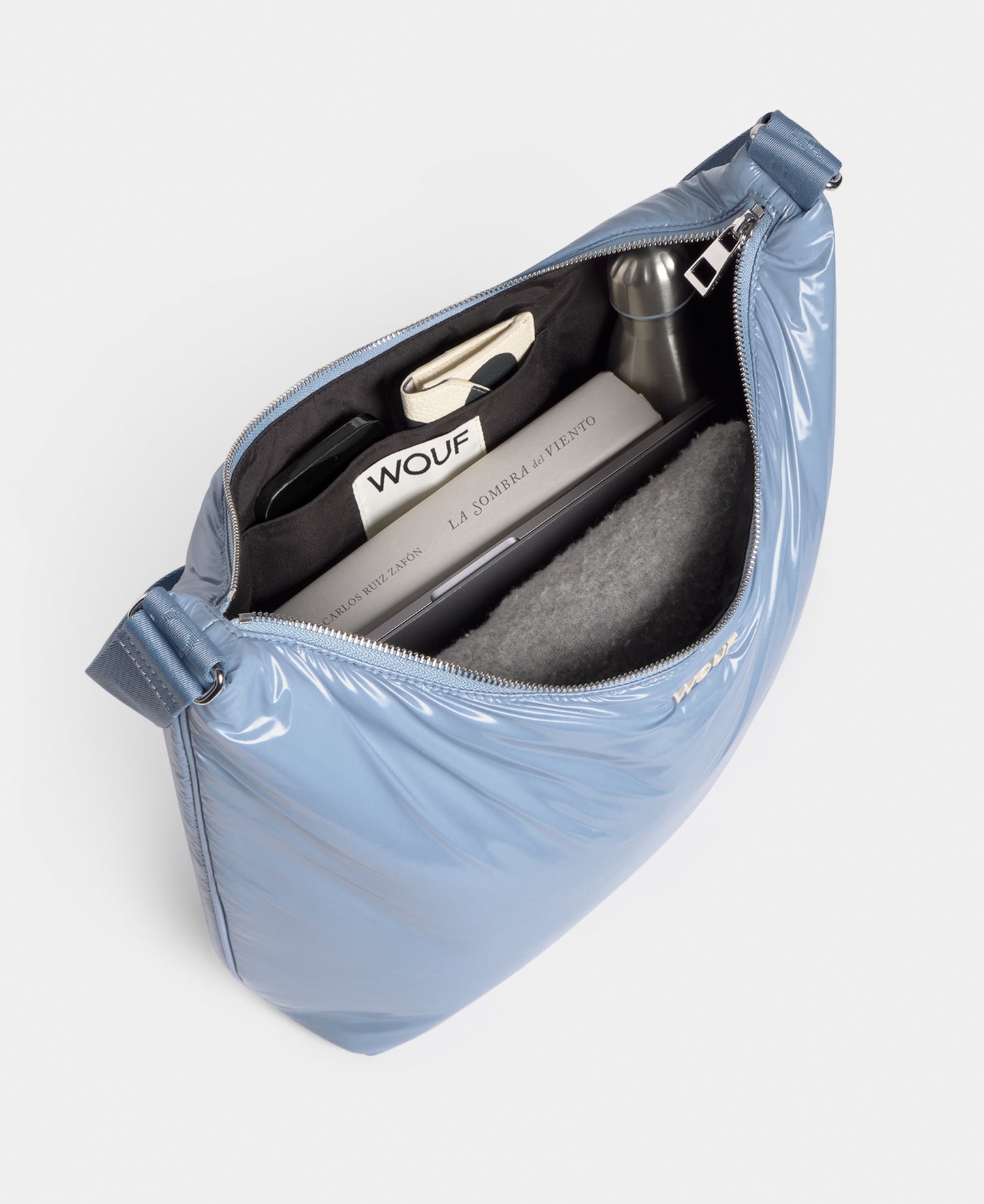 Interior of the hobo bag steel blue colour with a shiny finish - Wouf
