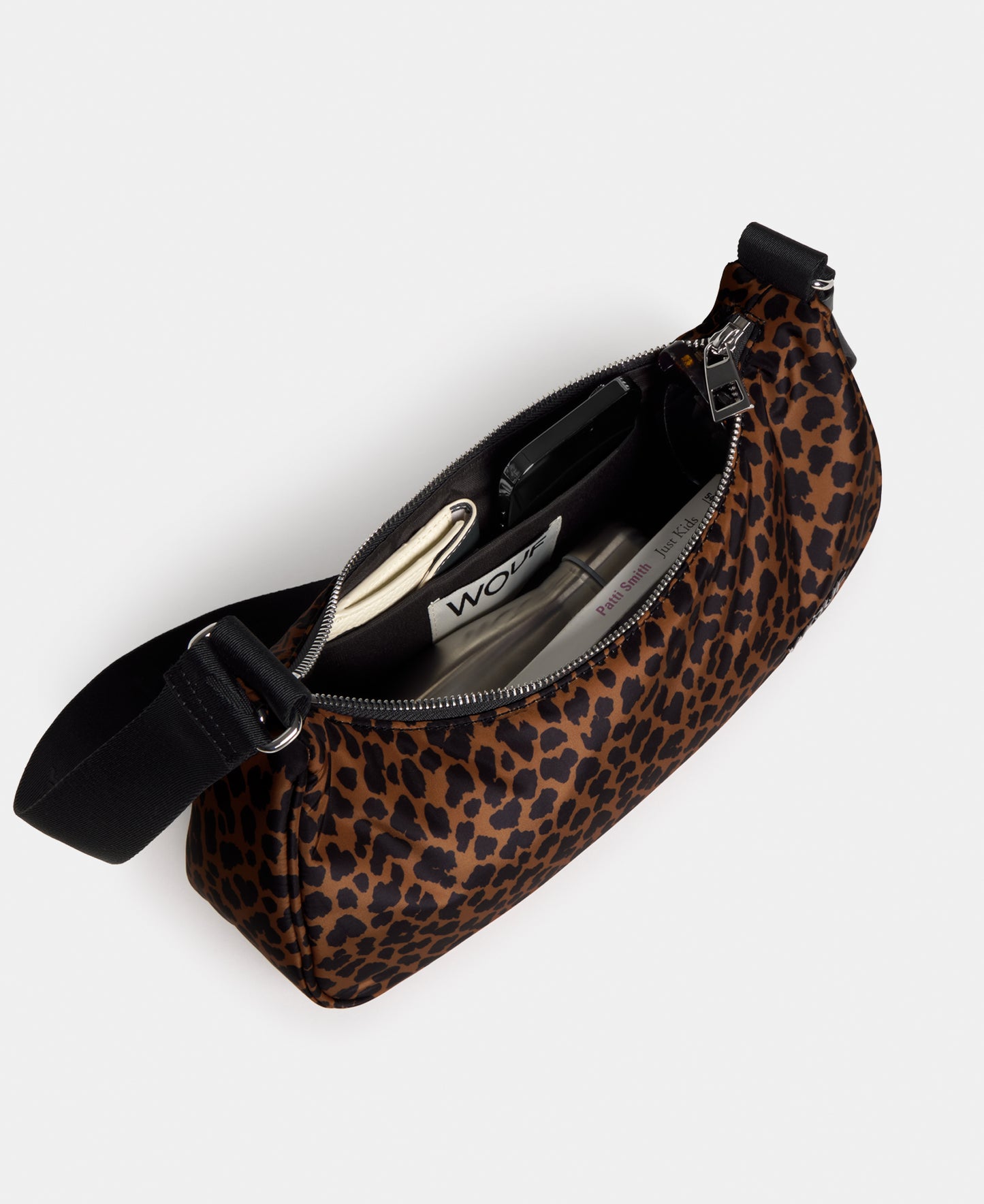 Interior of the crossbody bag with animal print in brown and black tones - Wouf