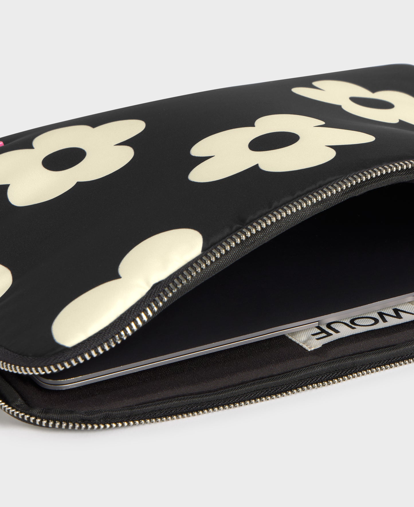 Interior of the laptop sleeve 13-14 with white floral print on a black background - Wouf