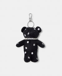 Bear-shaped bag charm with embroidered white polka dots on a black background - Wouf