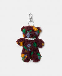 Bear-shaped bag charm in teddy fabric with multicolour floral print on a burgundy background - Wouf