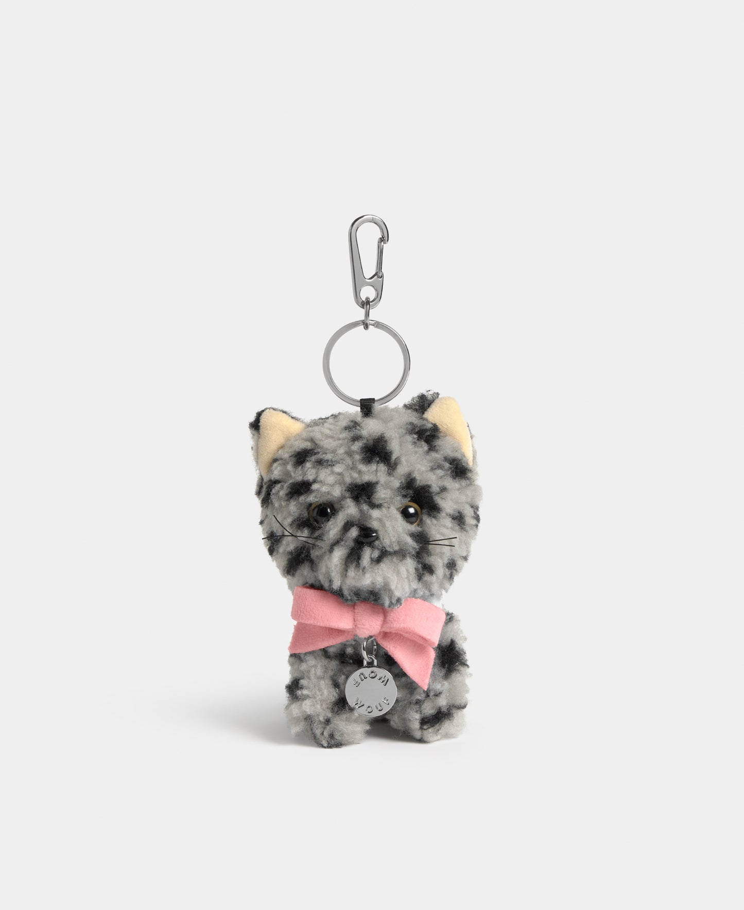 Cat-shaped bag charm in grey teddy fabric with black animal print and a pink bow - Wouf