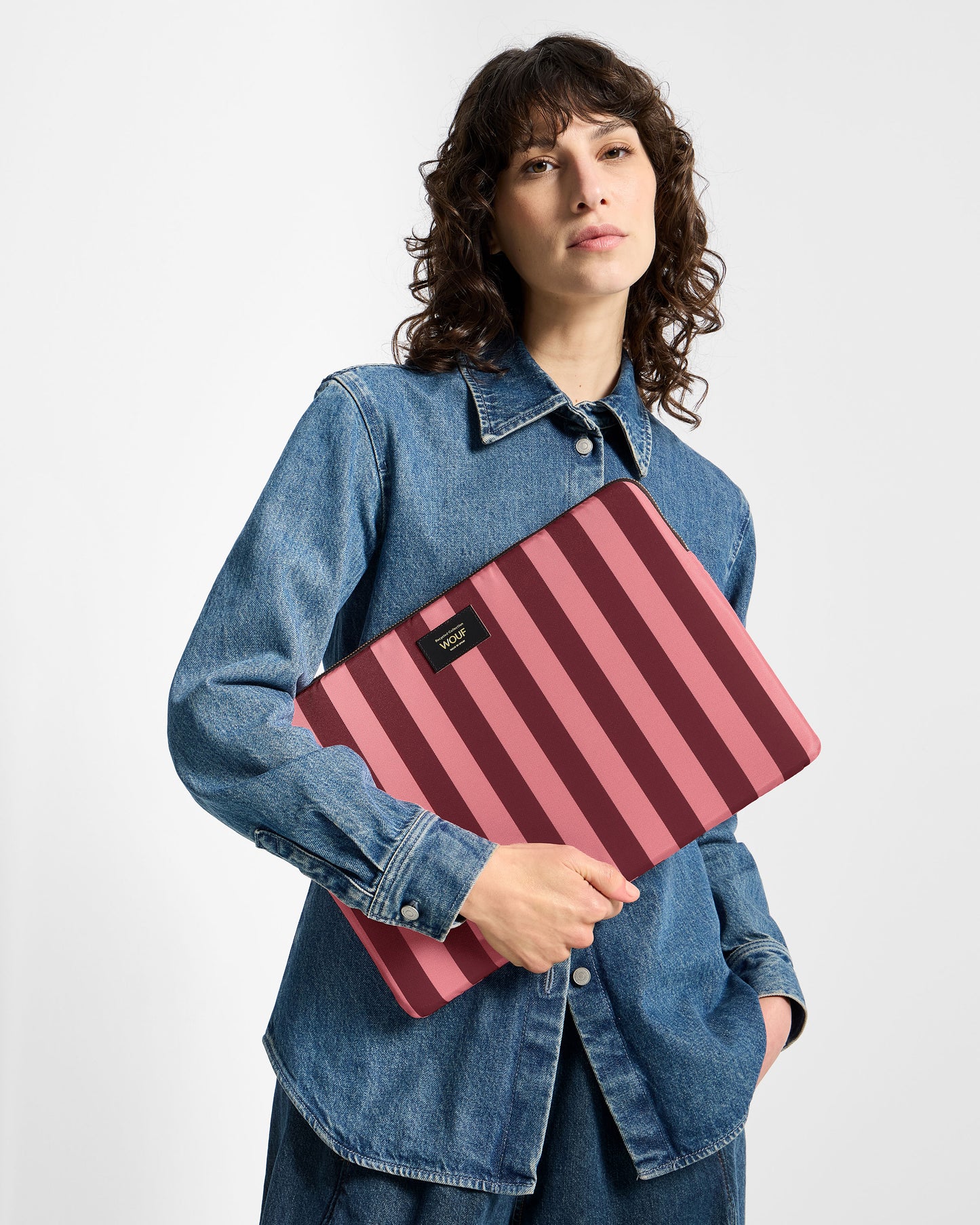 Model with 15-16-inch laptop sleeve with pink and burgundy striped print - Wouf