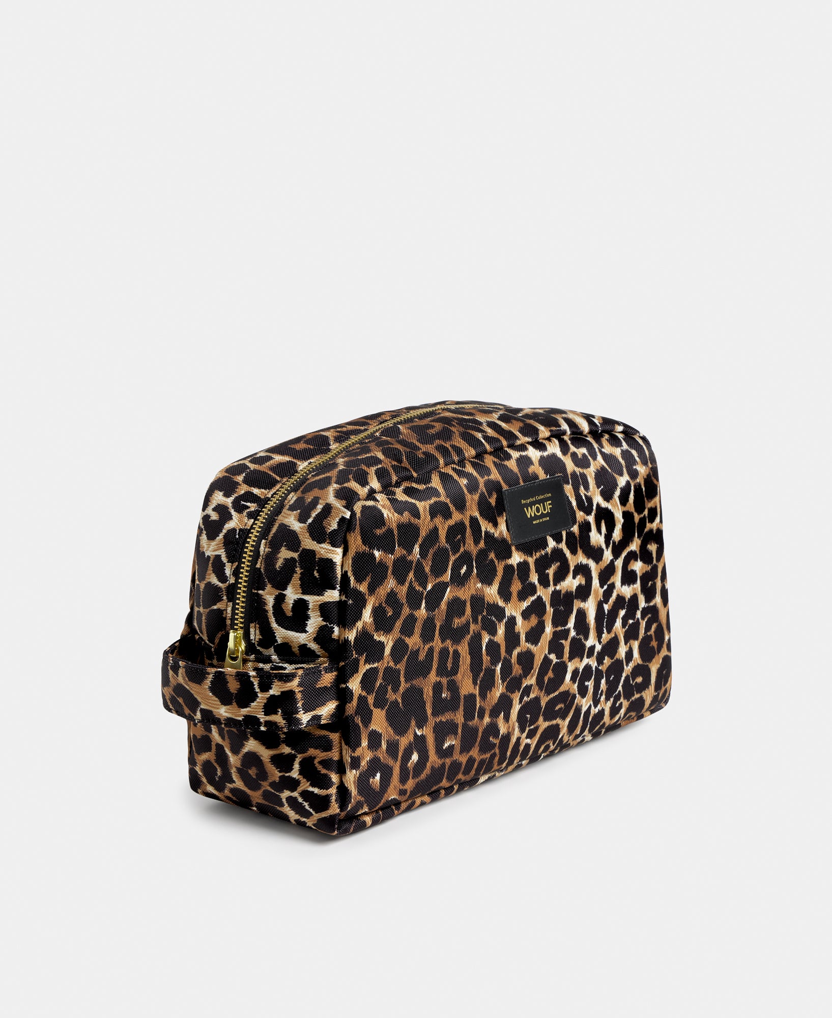Side view of the Icon large toiletry bag with black and brown leopard print - Wouf
