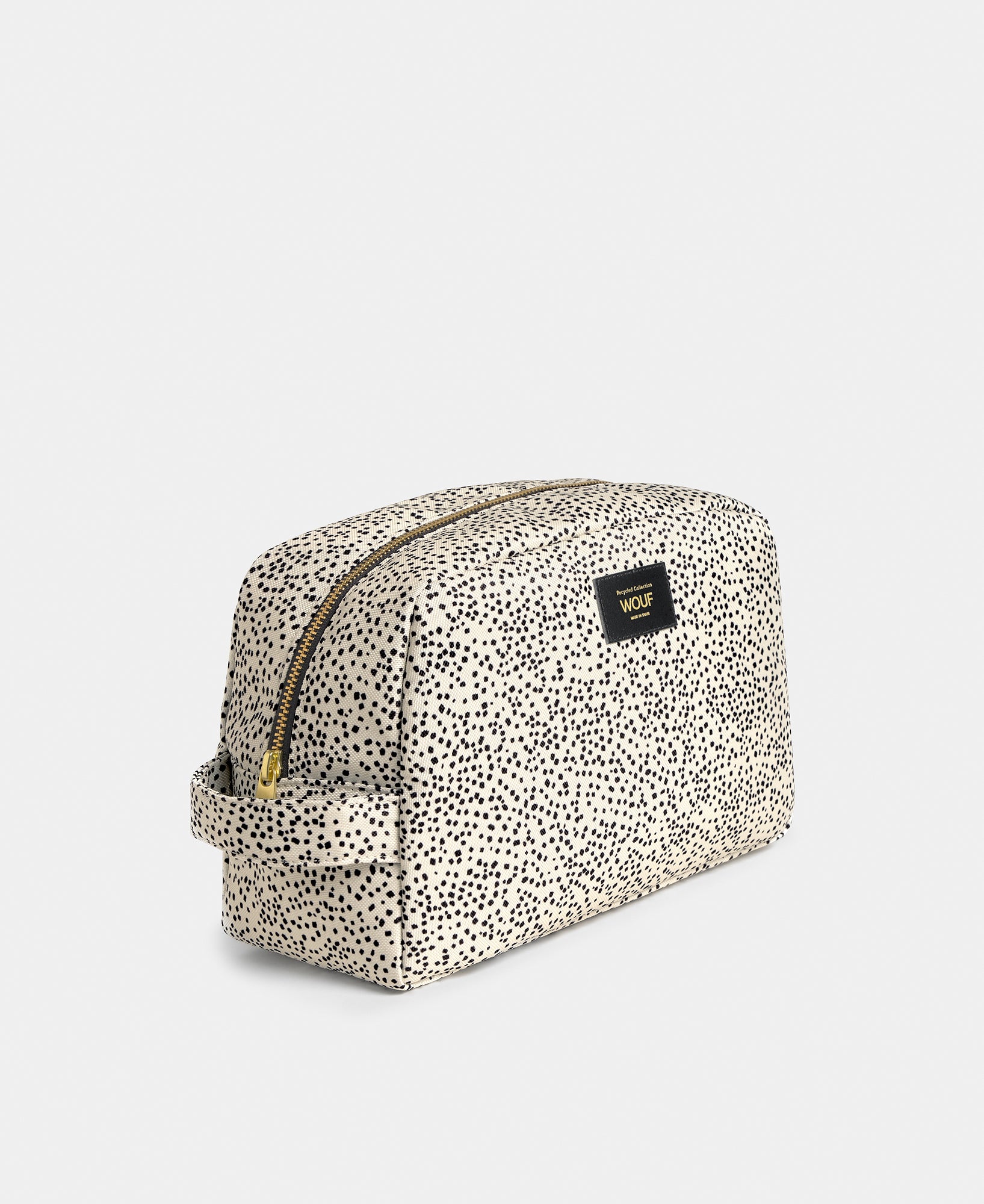 Side view of the Panna large toiletry bag with beige and black micro print - Wouf