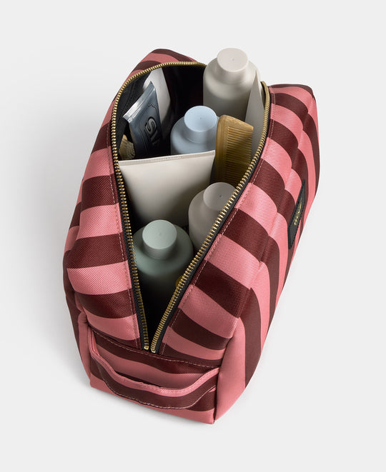 Interior detail of the Sophie large toiletry bag with pink and burgundy striped print - Wouf