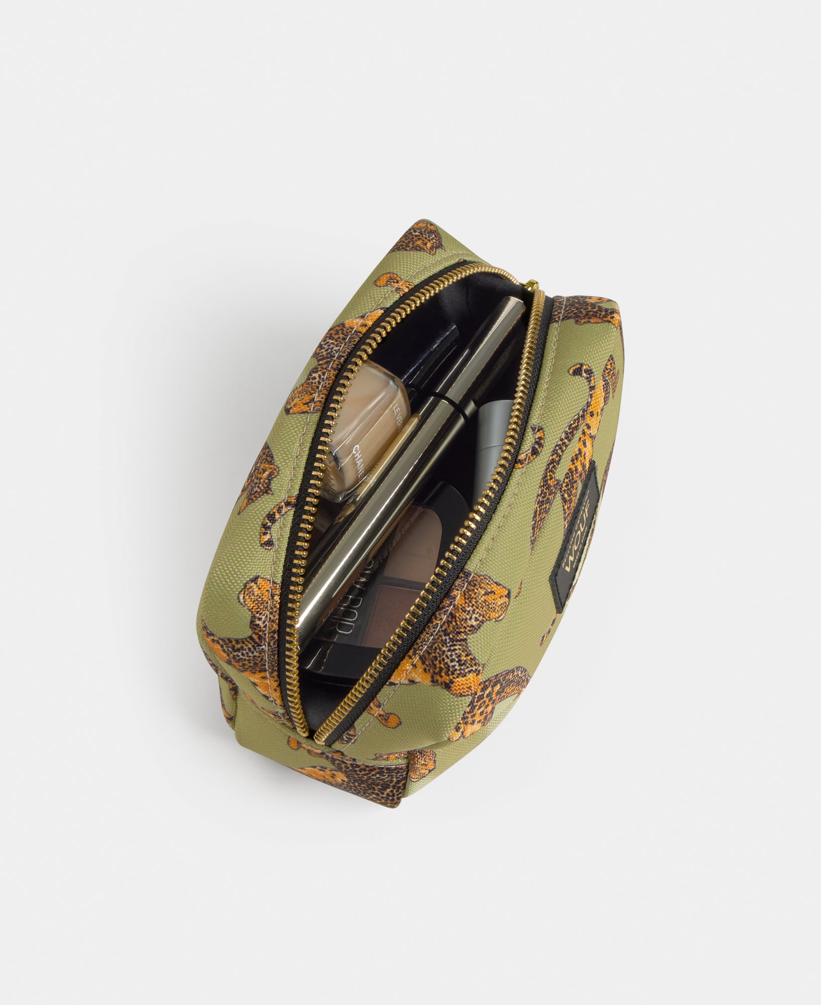 Interior detail of the Avo Leopard makeup bag with green and black leopard print - Wouf
