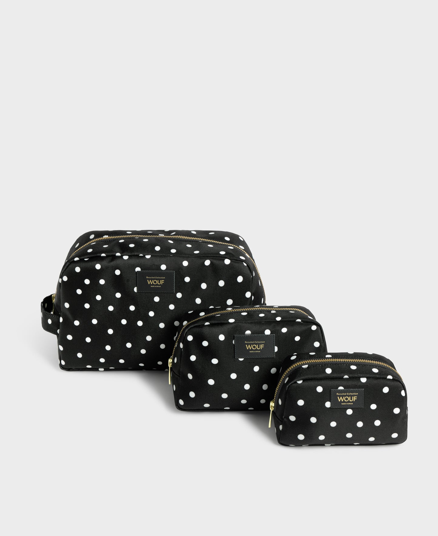 Grace toiletry bag set with white polka dot print on a black background - Wouf