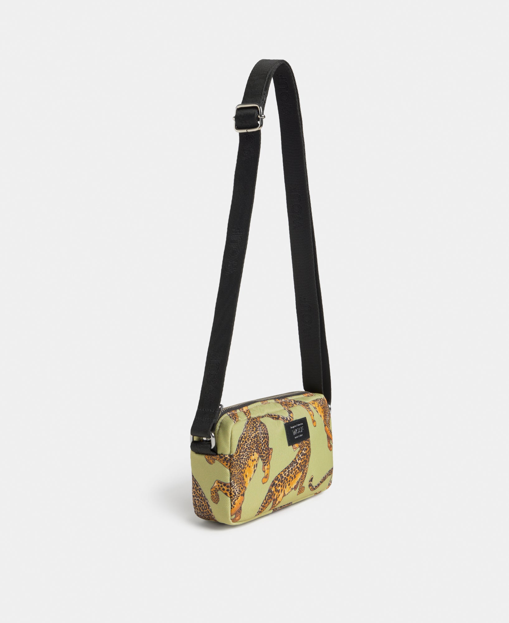 Side view of the Avo Leopard mini bag with green and black leopard print - Wouf