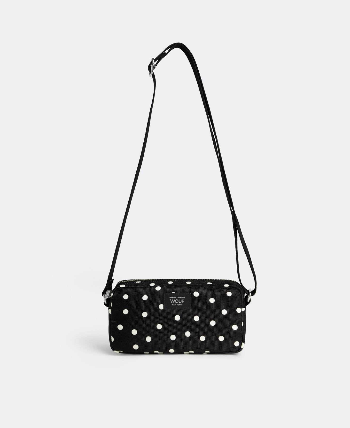 Grace mini crossbody bag with white polka dot print on a black background - Wouf