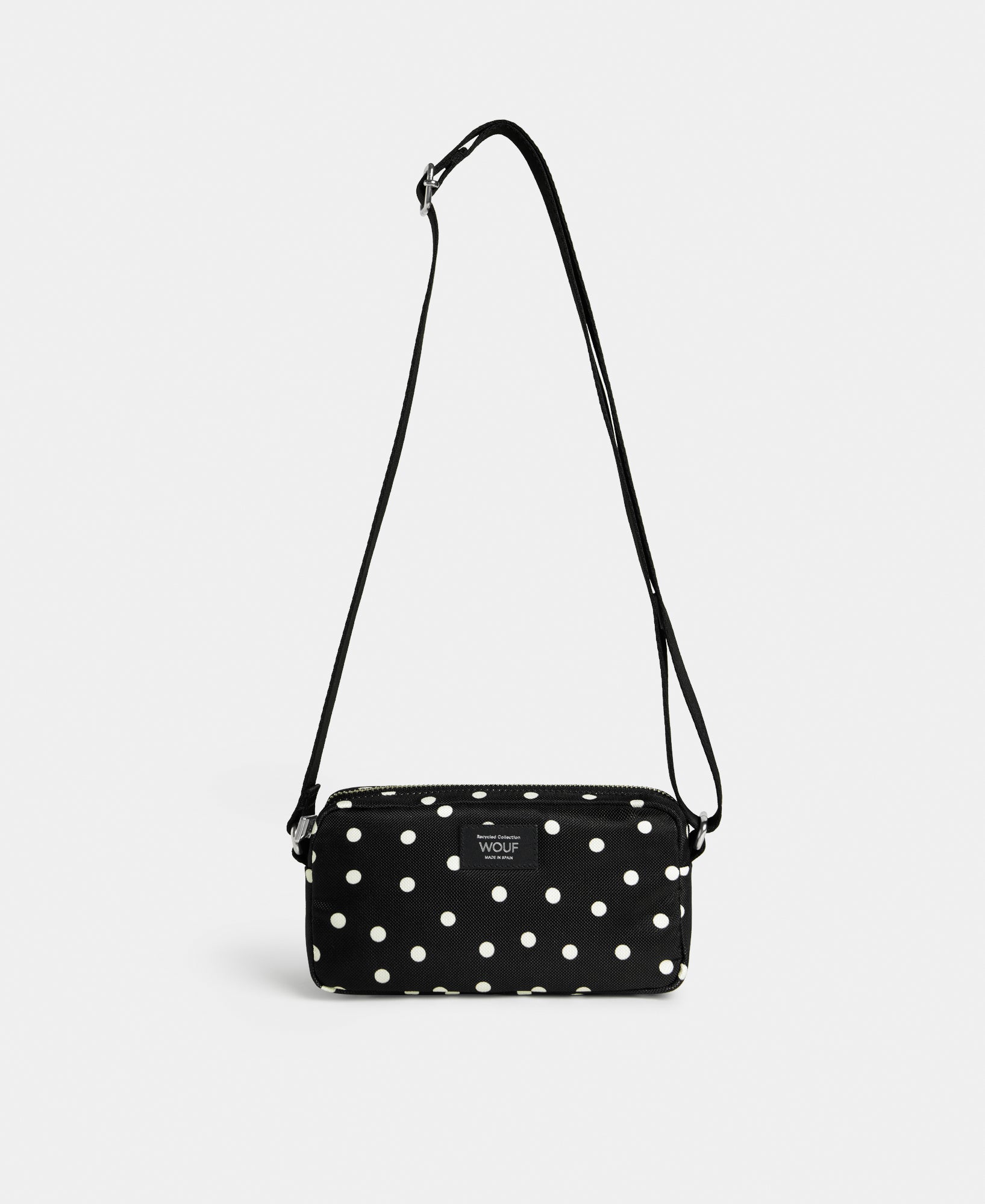 Grace mini crossbody bag with white polka dot print on a black background - Wouf