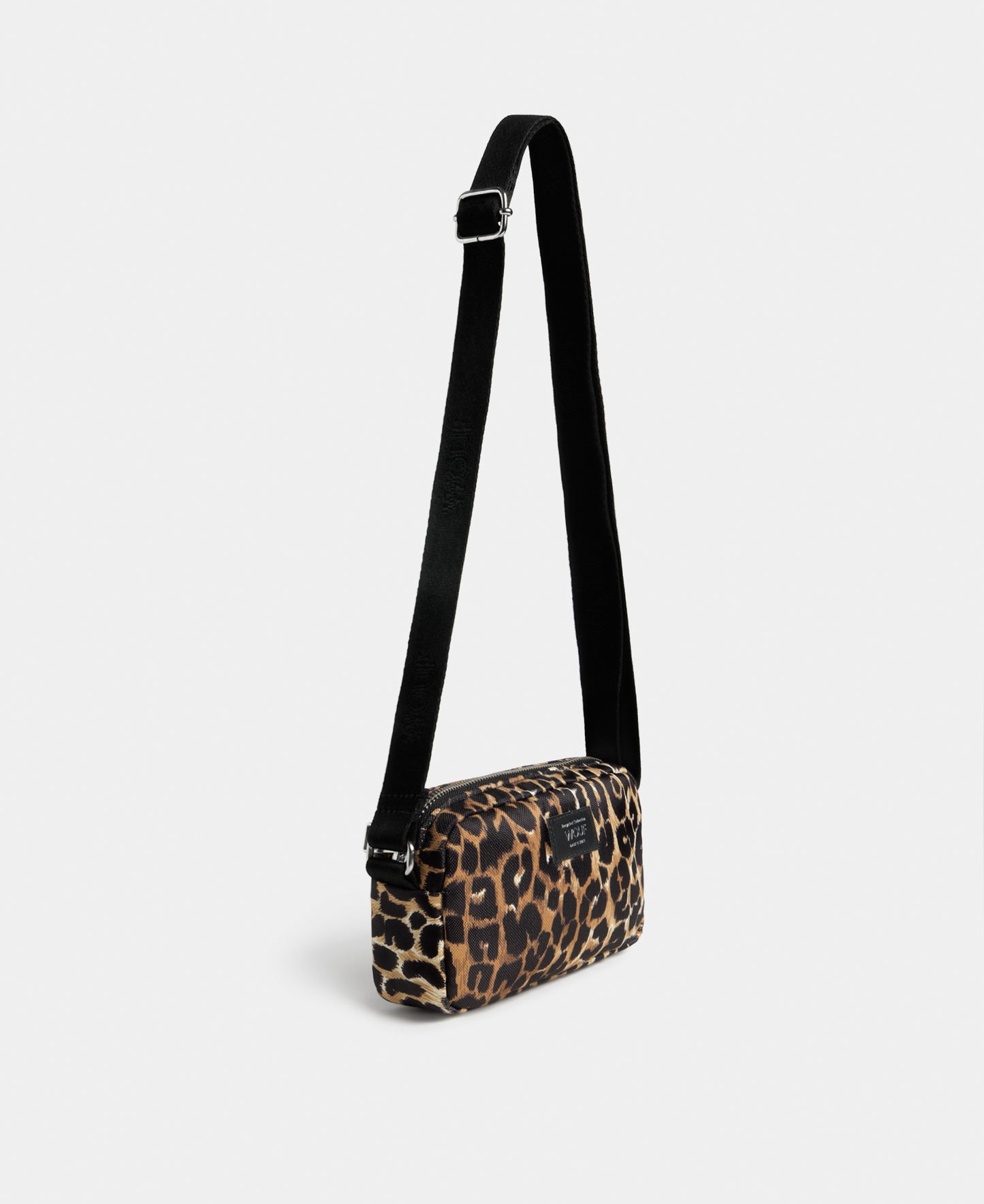 Side view of the Icon mini bag with black and brown leopard print - Wouf