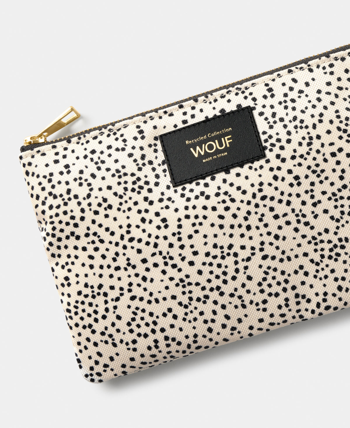 Détail de la pochette Panna à micro-imprimé beige et noir - Wouf