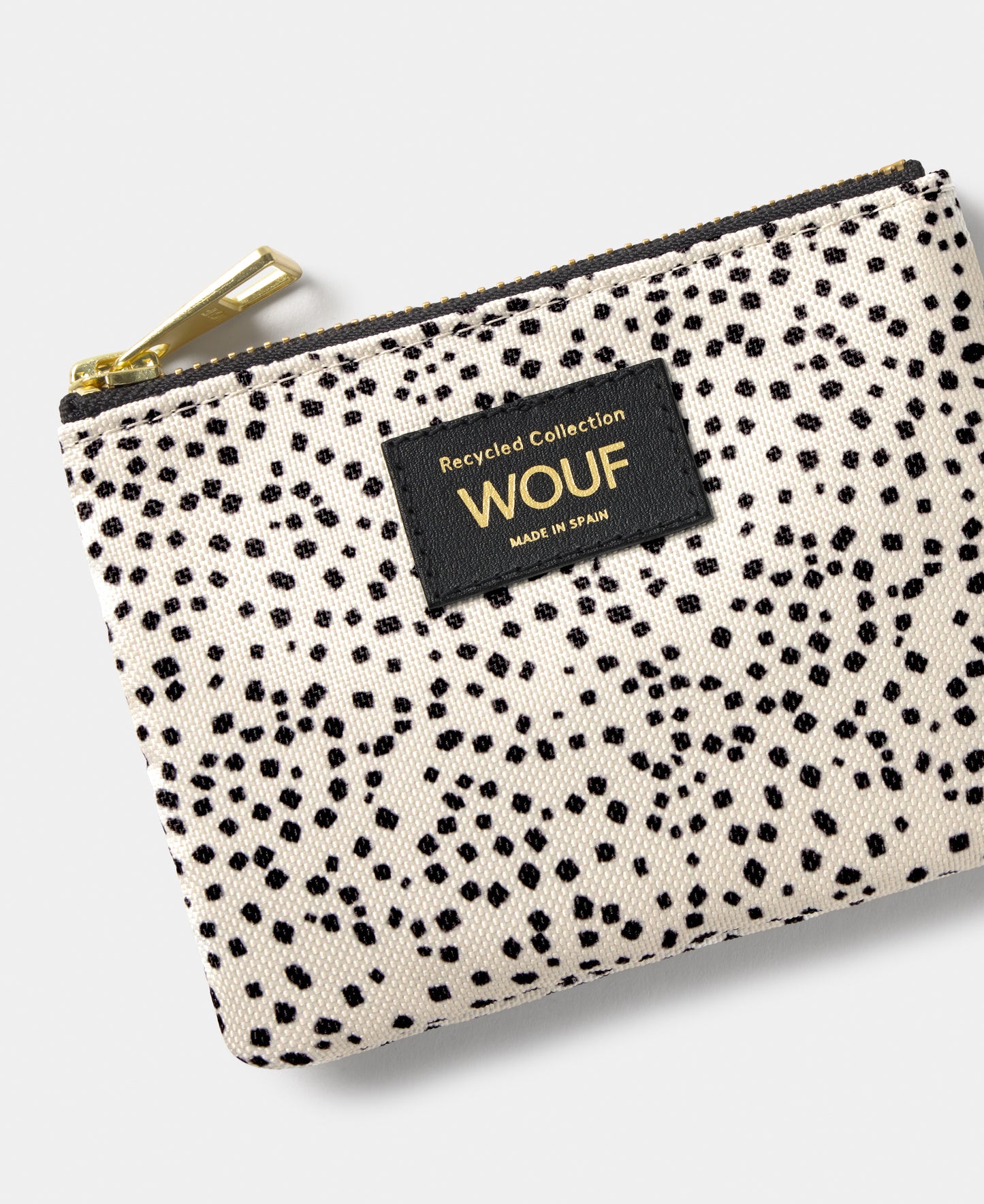 Detail of the Panna small pouch with beige and black micro print - Wouf
