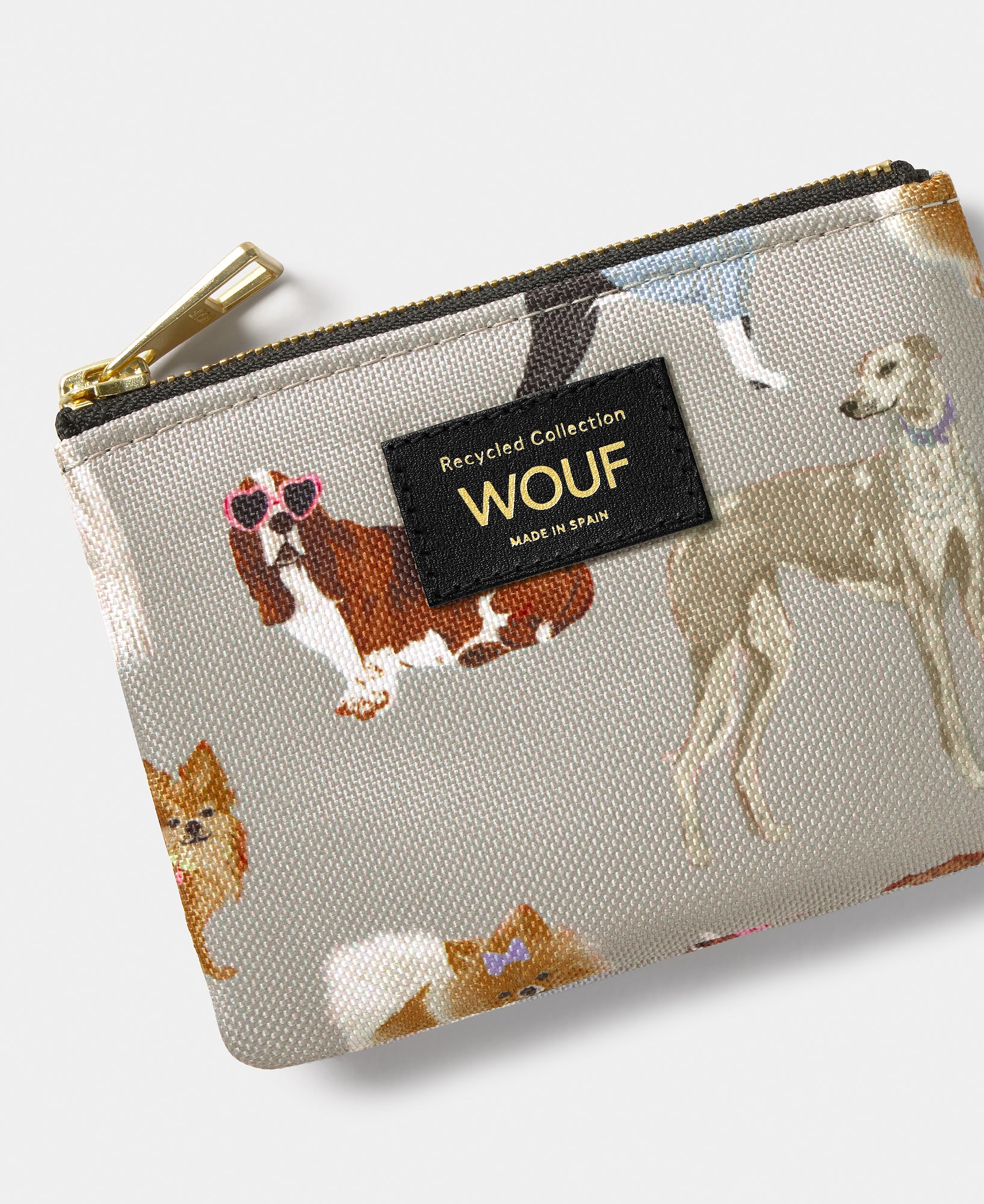 Detail of the Puppy small pouch with multicolour dog print on a grey background - Wouf