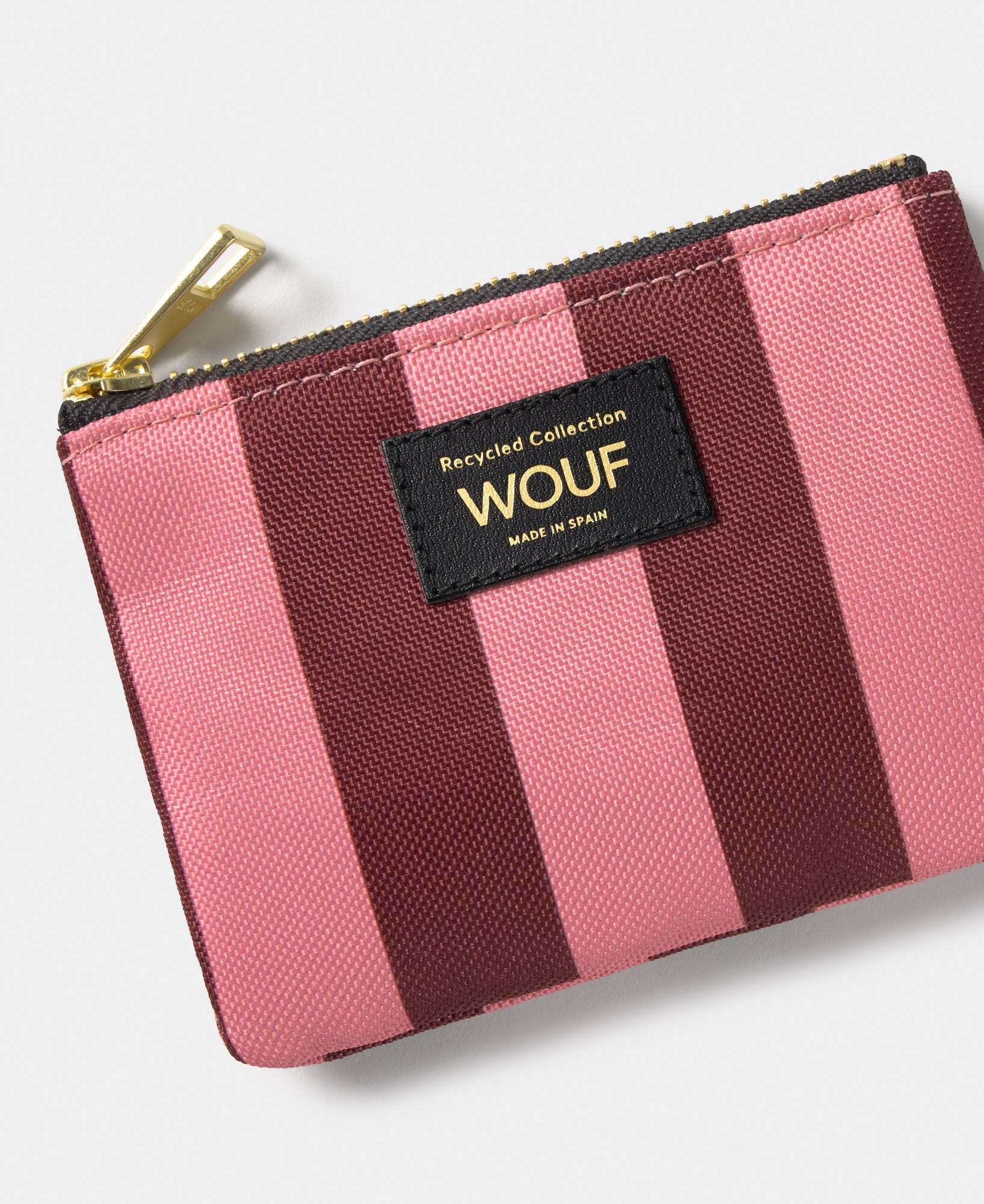 Detail of the Sophie small pouch with pink and burgundy striped print - Wouf