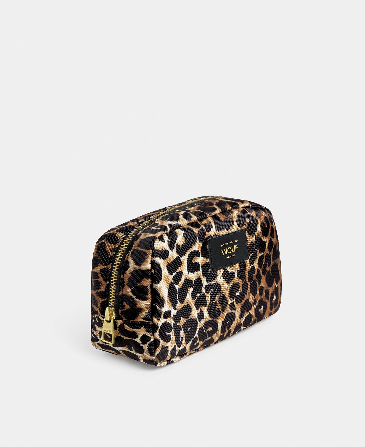 Side view of the Icon toiletry bag with black and brown leopard print - Wouf