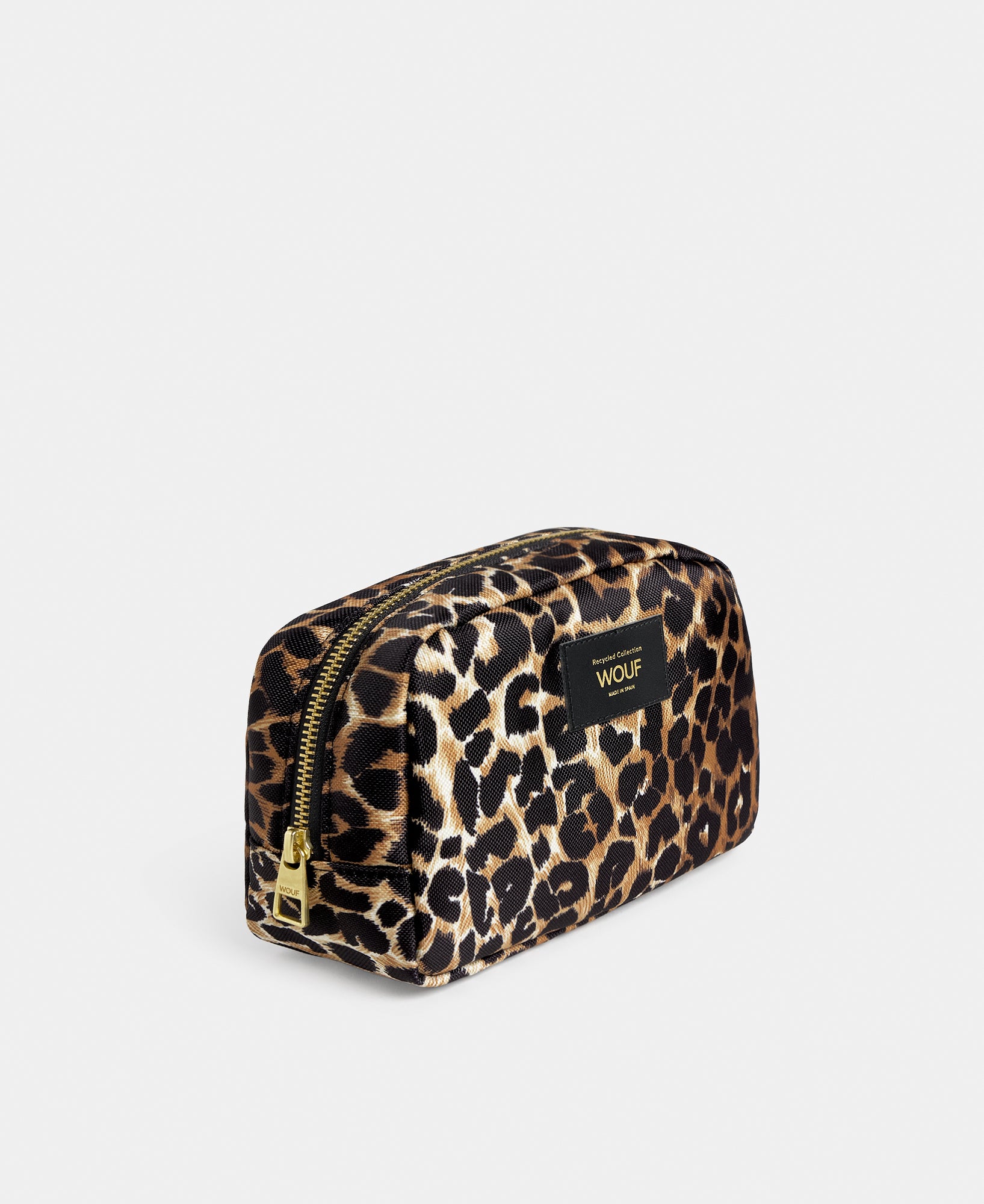 Side view of the Icon toiletry bag with black and brown leopard print - Wouf