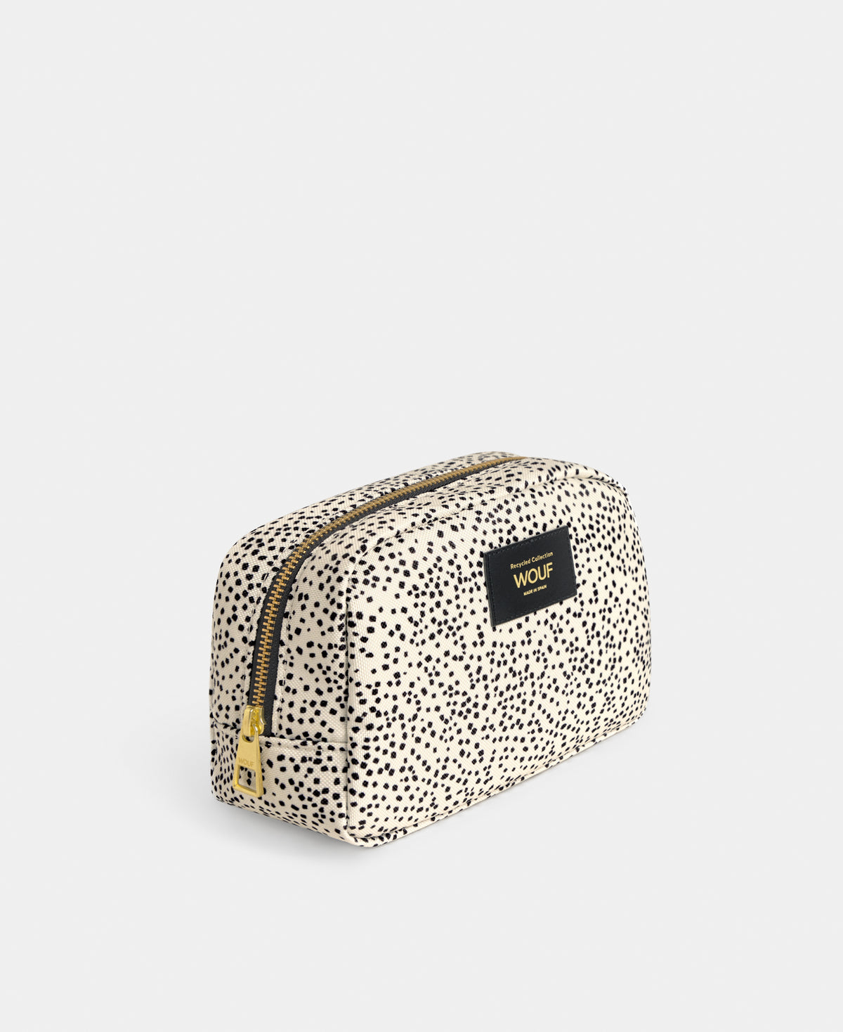 Vue latérale de la trousse de toilette Panna à micro-imprimé beige et noir - Wouf