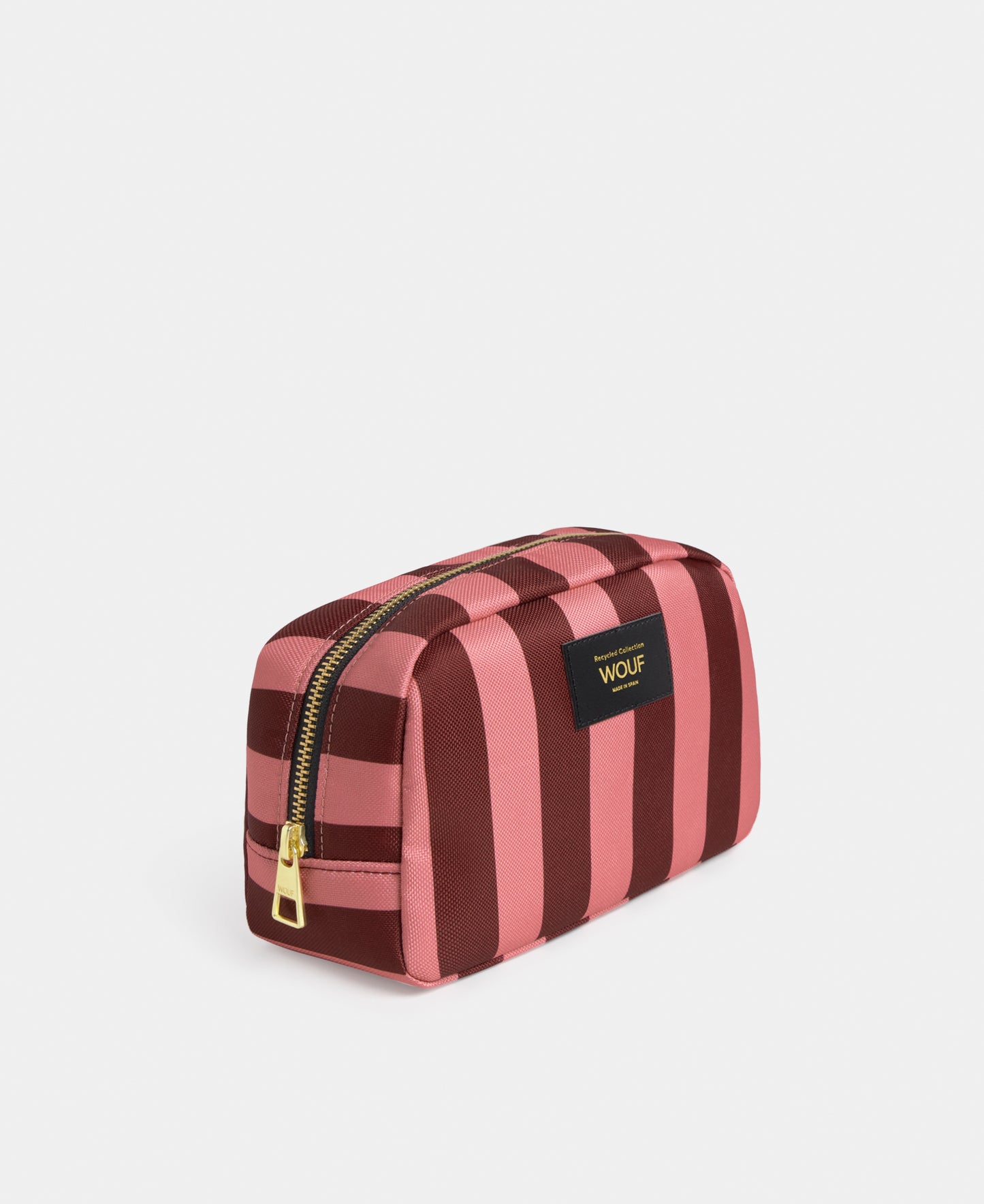 Side view of the Sophie toiletry bag with pink and burgundy striped print - Wouf