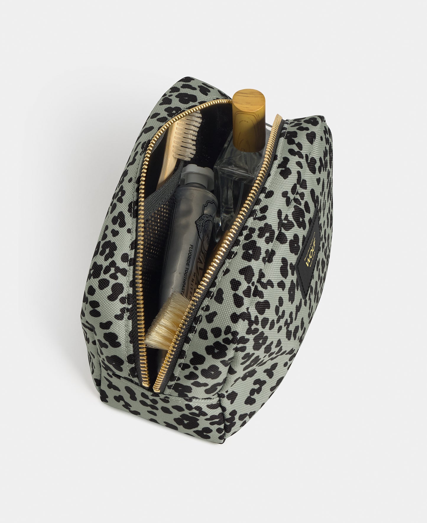Interior detail of the Steel Roar toiletry bag with grey and black animal print - Wouf