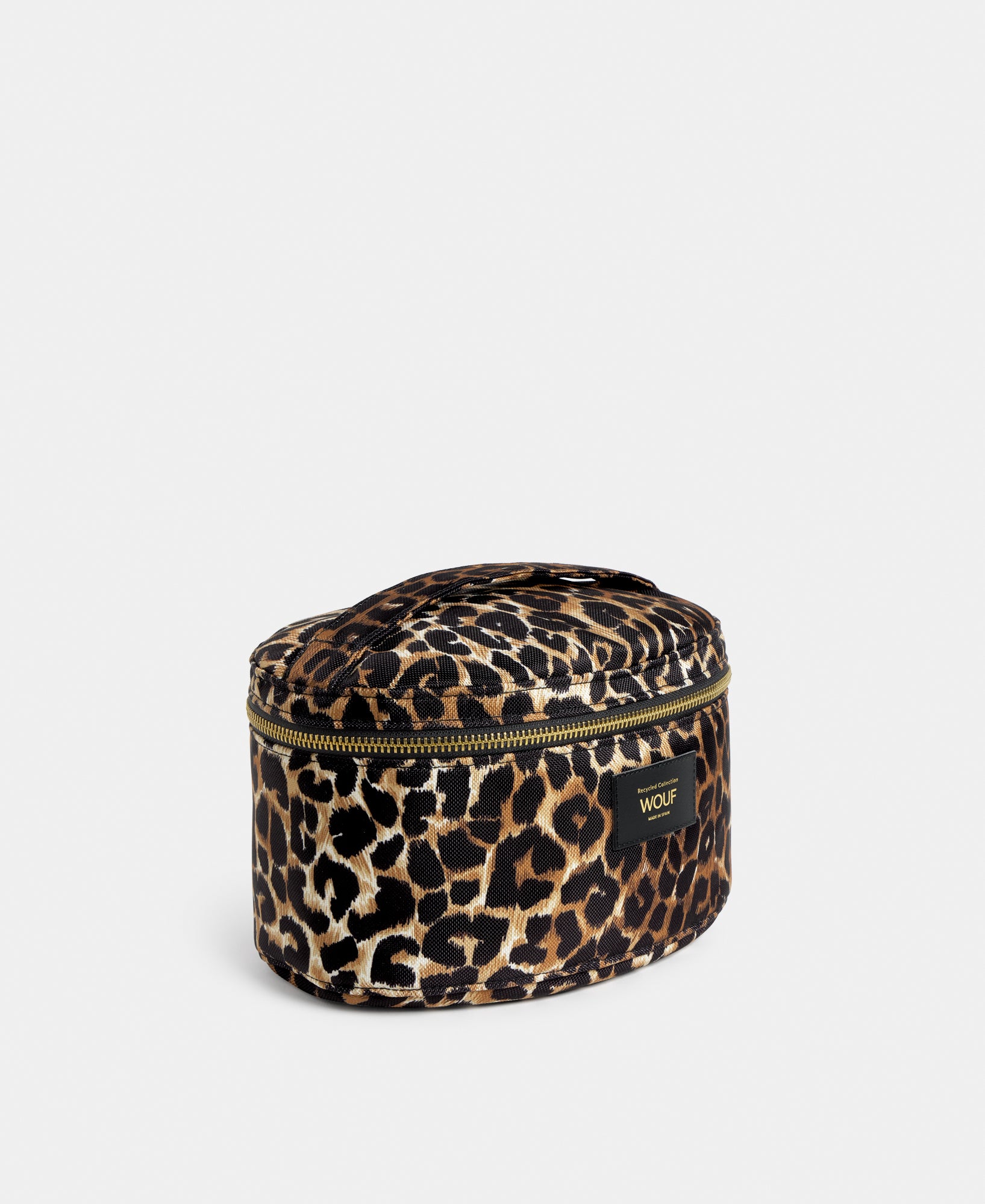 Side view of the Icon vanity bag with black and brown leopard print - Wouf