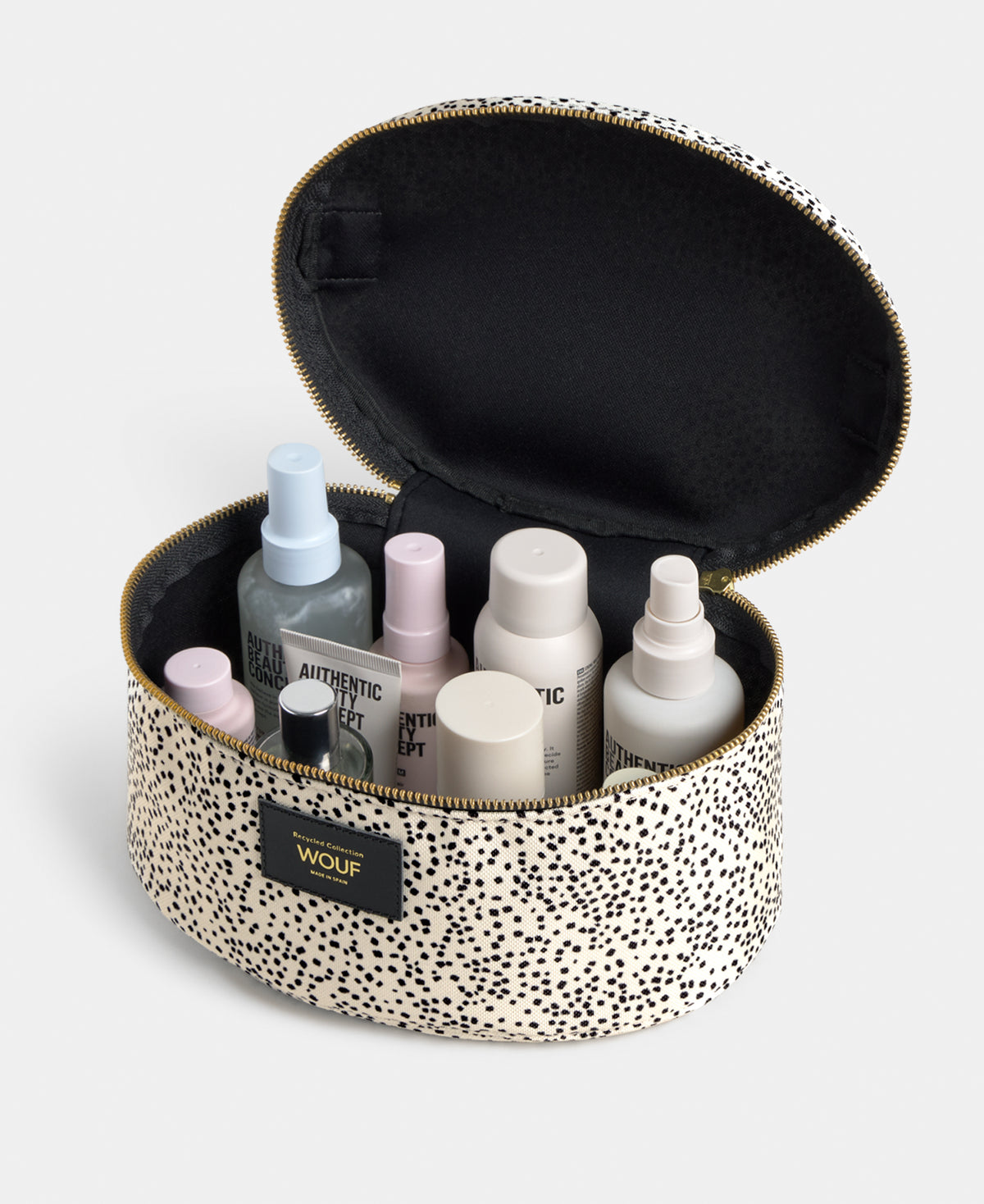 Detalle interior de neceser vanity Panna con microestampado en tonos beige y negro - Wouf