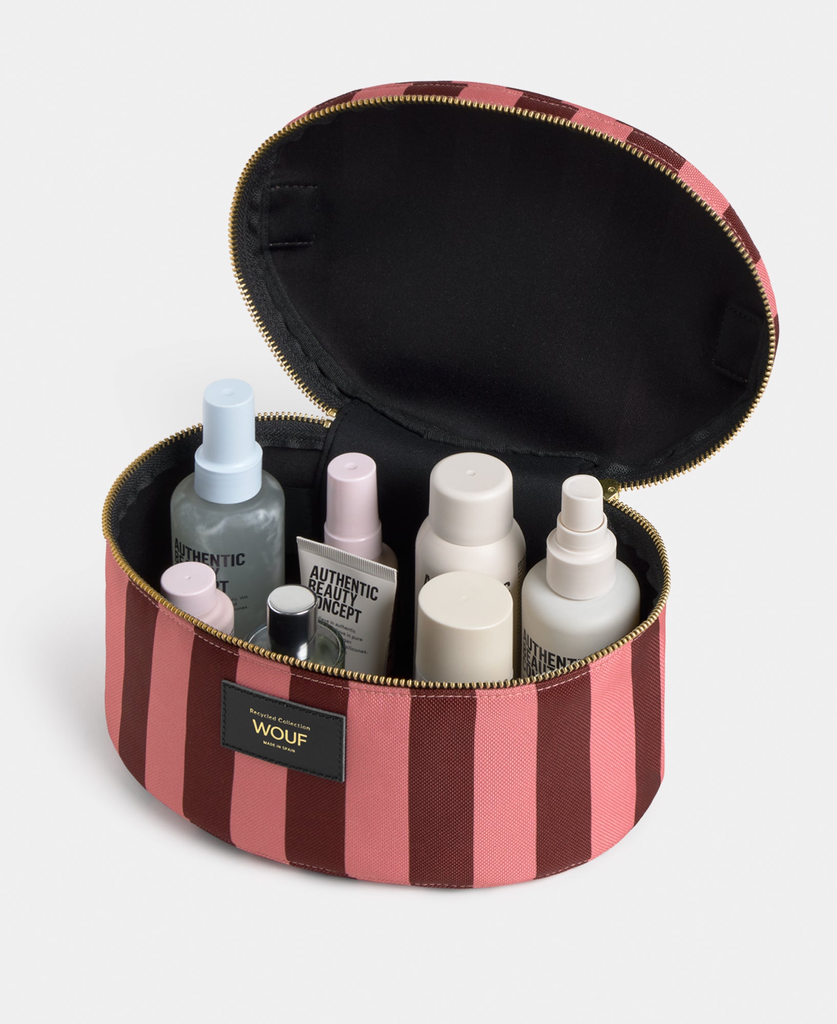 Interior detail of the Sophie vanity bag with pink and burgundy striped print - Wouf
