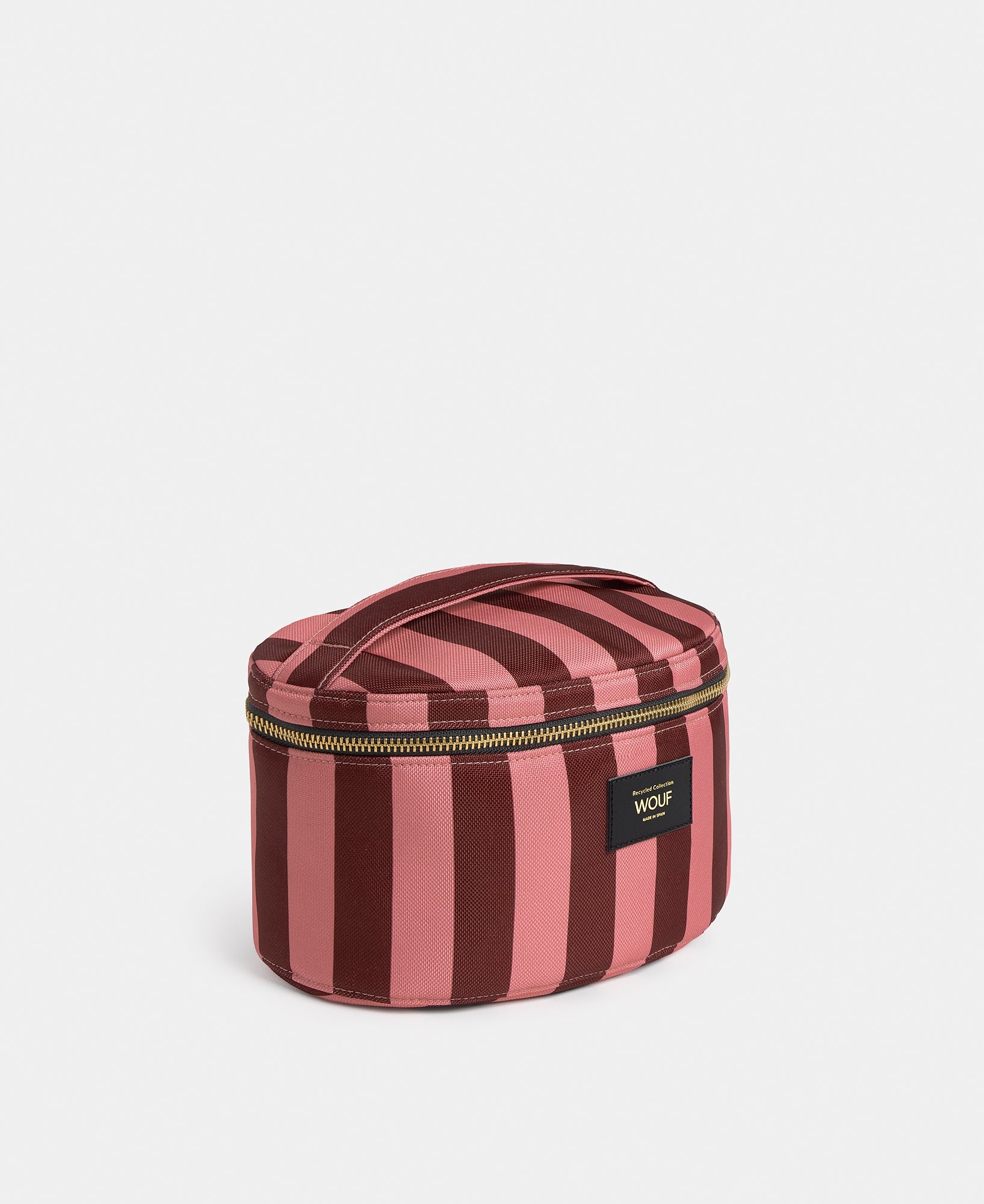 Side view of the Sophie vanity bag with pink and burgundy striped print - Wouf