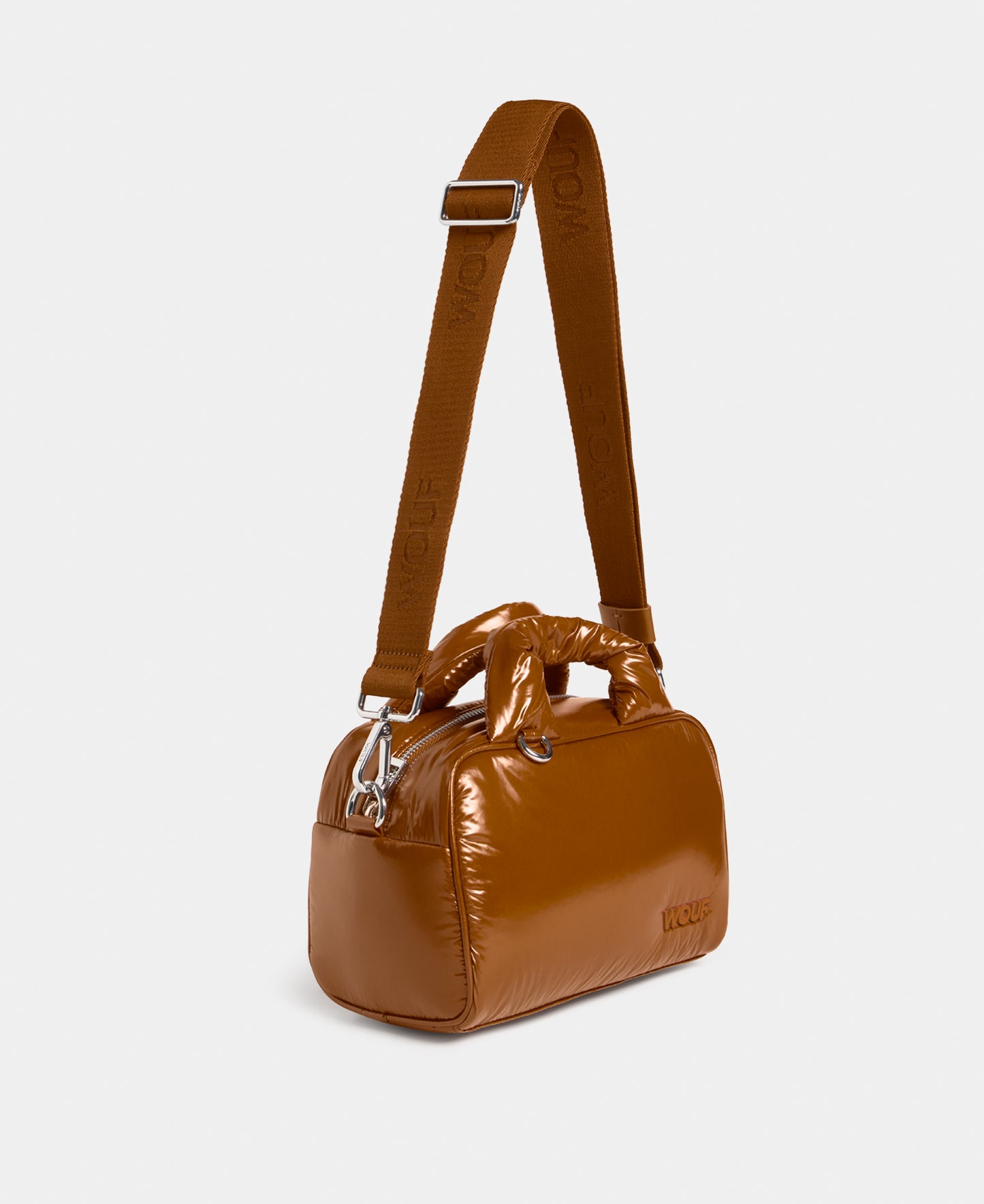 Side view of the bowling bag toasted brown colour with a shiny finish - Wouf