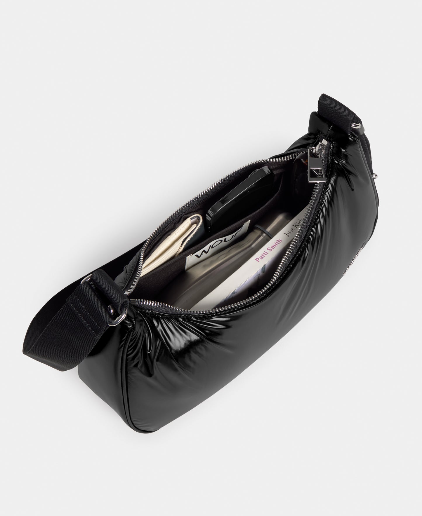 Interior of the crossbody bag black colour with a shiny finish - Wouf