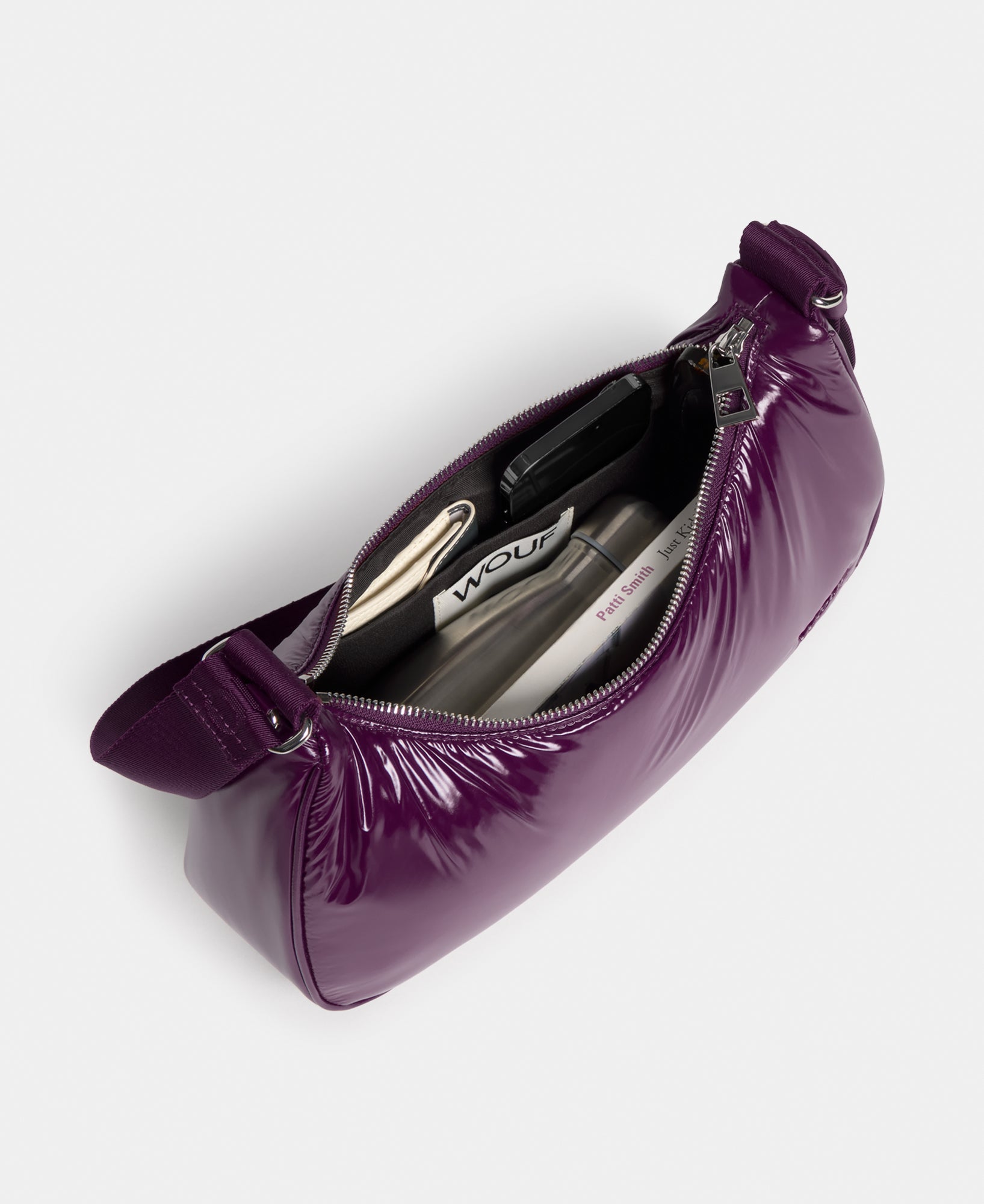 Interior of the crossbody bag plum colour with a shiny finish - Wouf