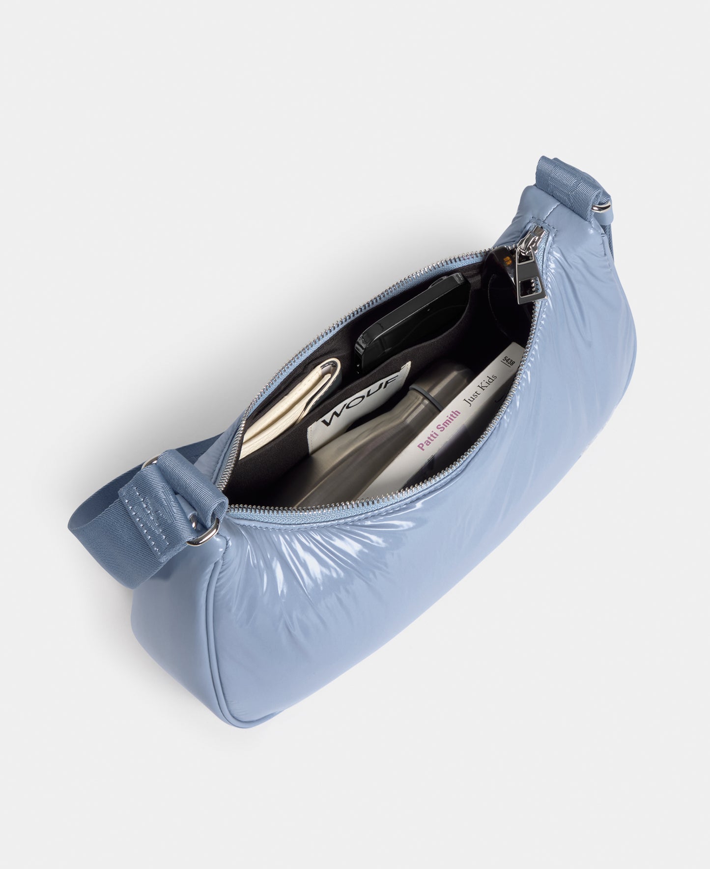 Interior of the crossbody bag steel blue colour with a shiny finish - Wouf
