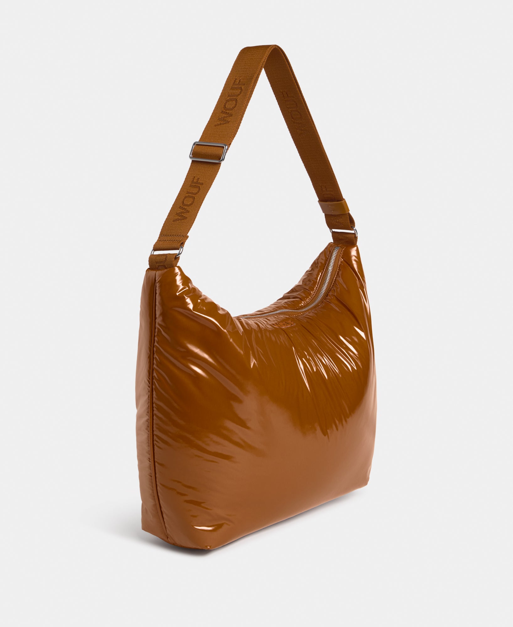 Vue latérale du hobo bag coloris brun chaud avec finition brillante - Wouf