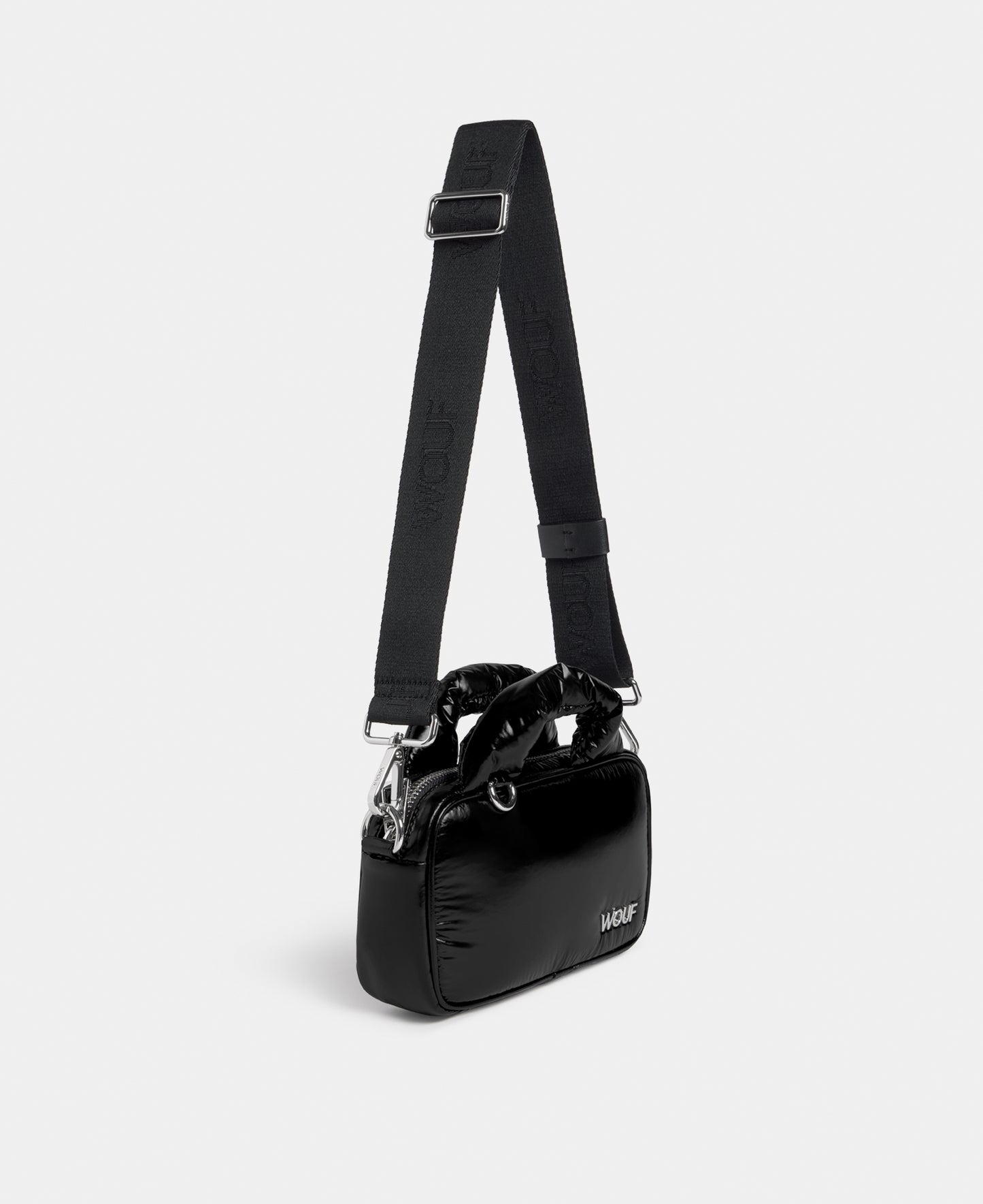 Side view of the mini bag black colour with a shiny finish - Wouf