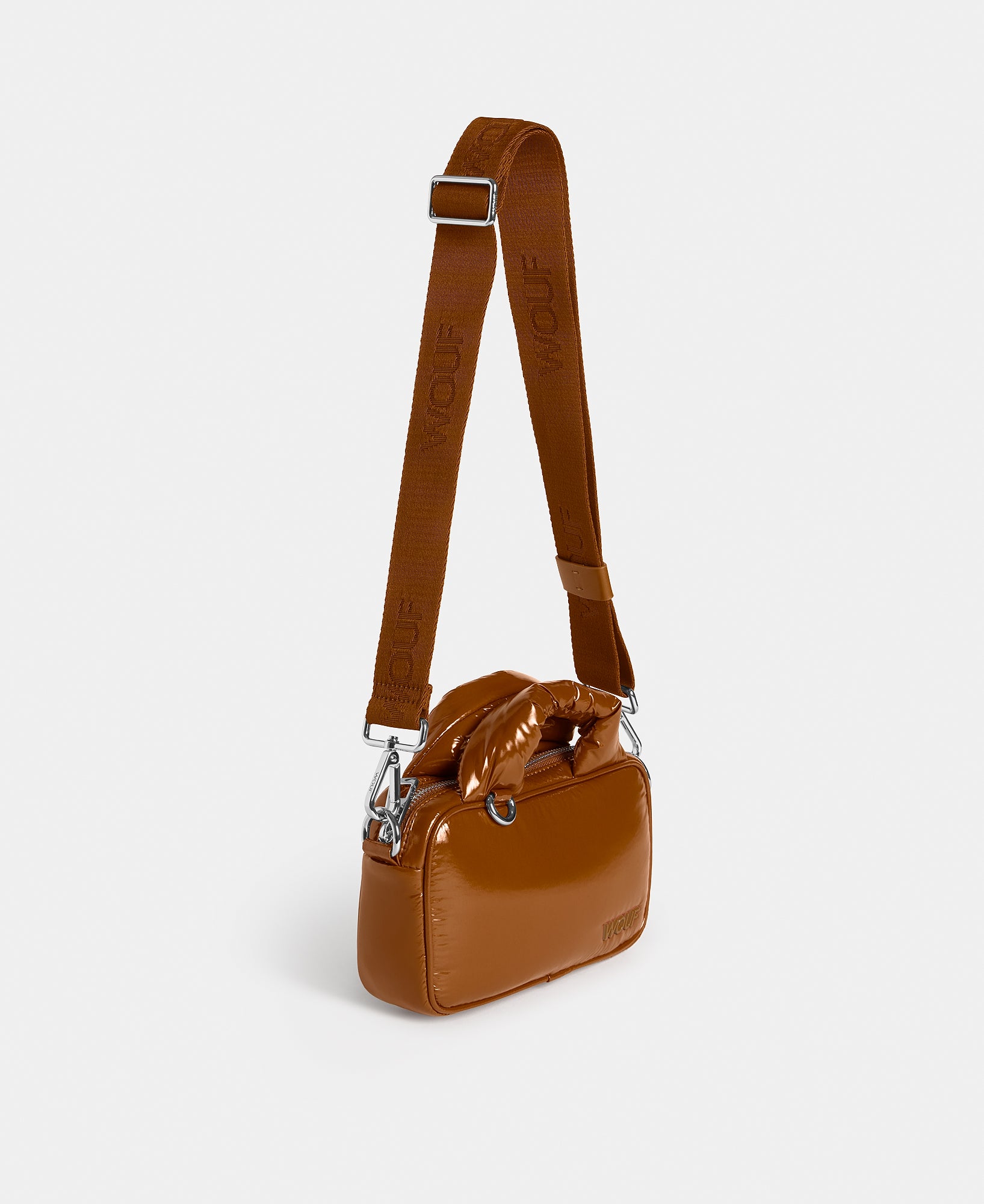 Side view of the mini bag toasted brown colour with a shiny finish - Wouf