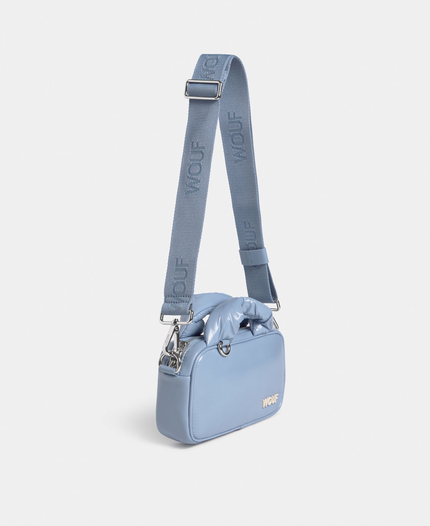 Side view of the mini bag steel blue colour with a shiny finish - Wouf