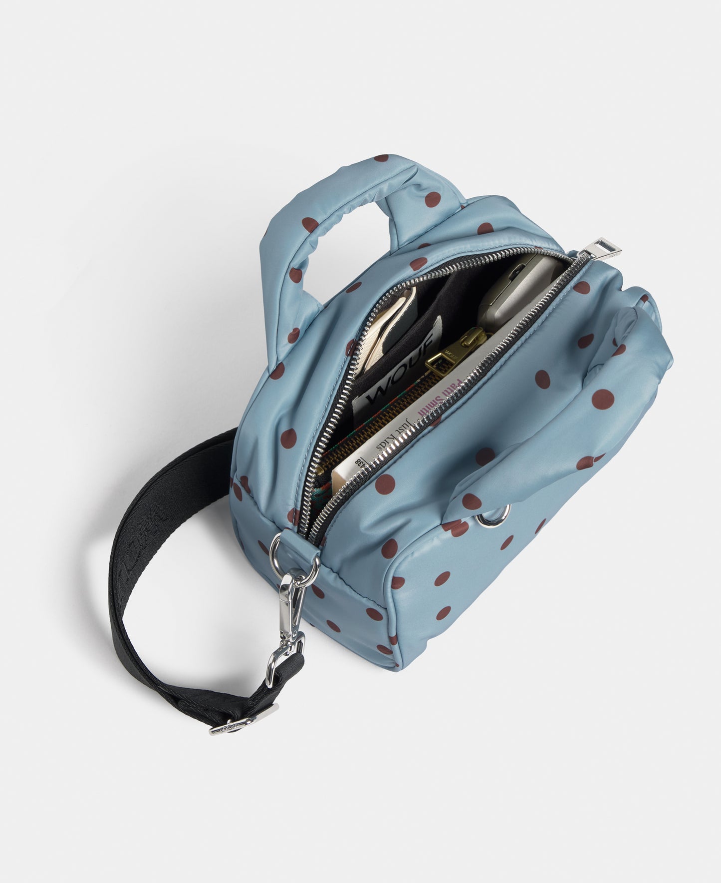 Interior of the bowling bag with brown polka dots on a light blue background - Wouf