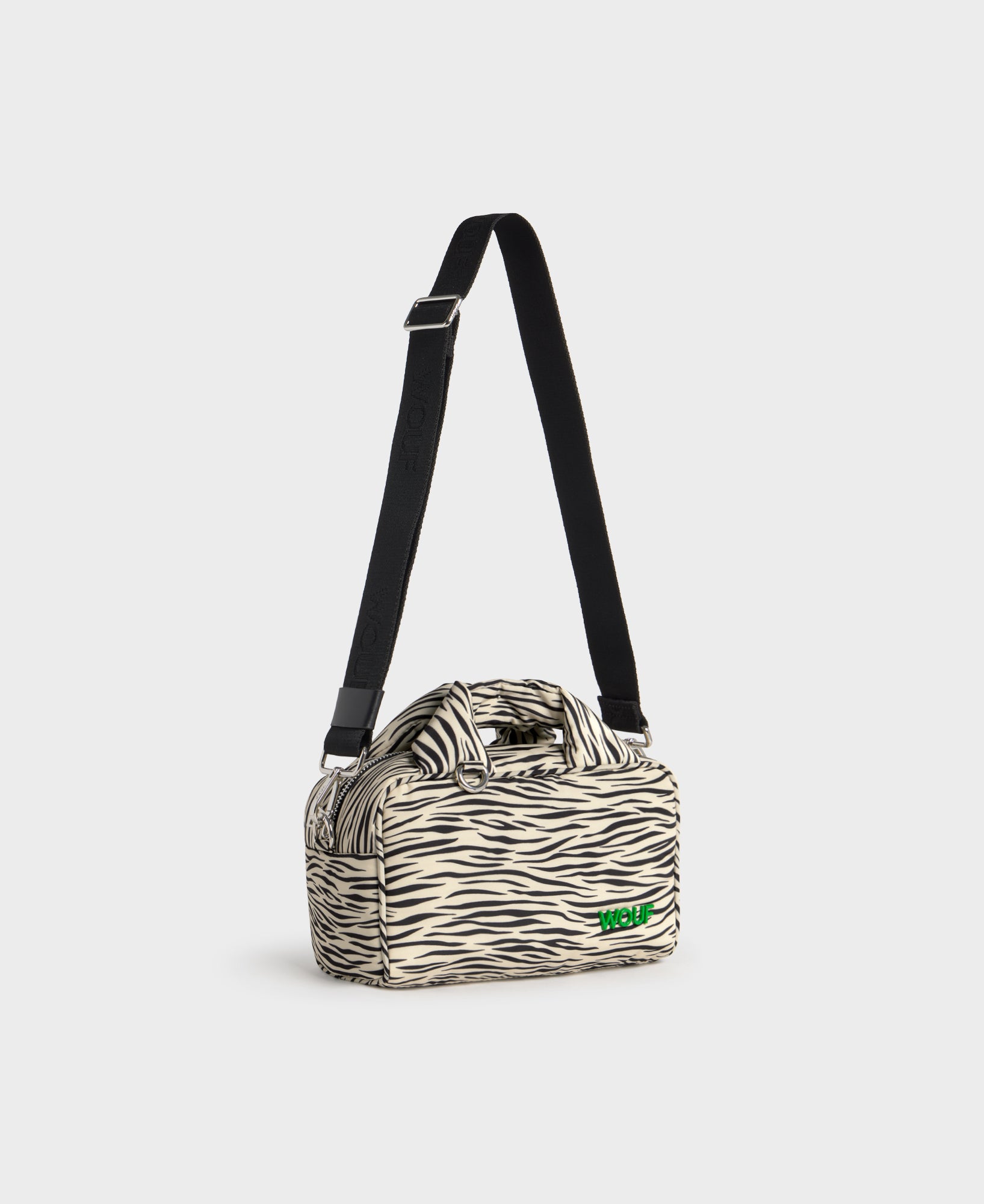 Side view of the bowling bag with zebra print in beige and black tones - Wouf