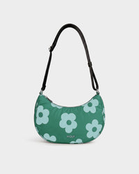 Crossbody bag with mint blue daisy print on a green background - Wouf