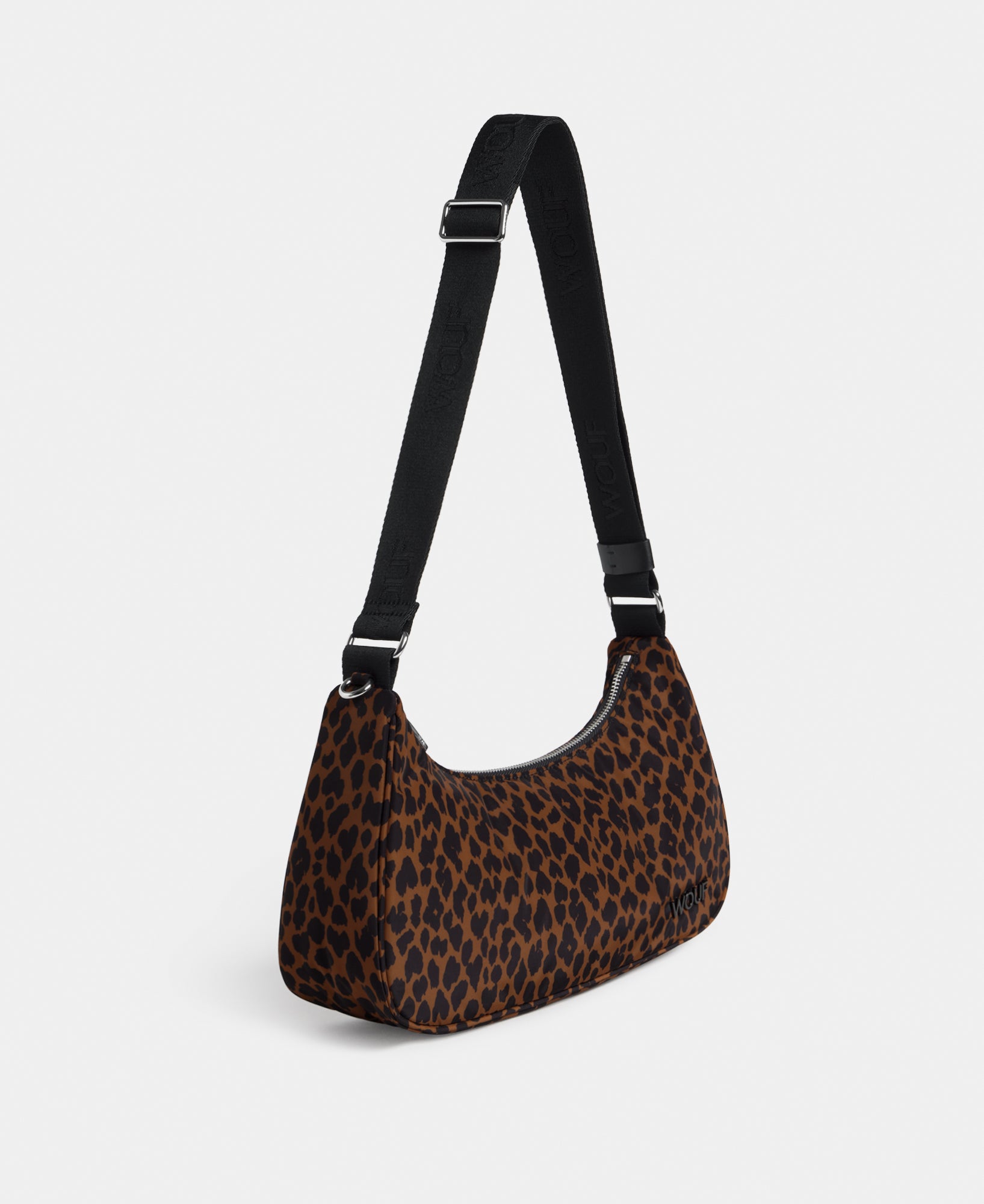 Side view of the crossbody bag with animal print in brown and black tones - Wouf