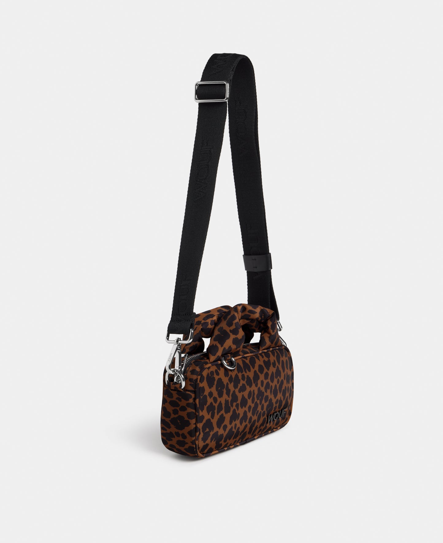 Vista lateral del mini bolso con estampado animal en tonos marrones y negros - Wouf