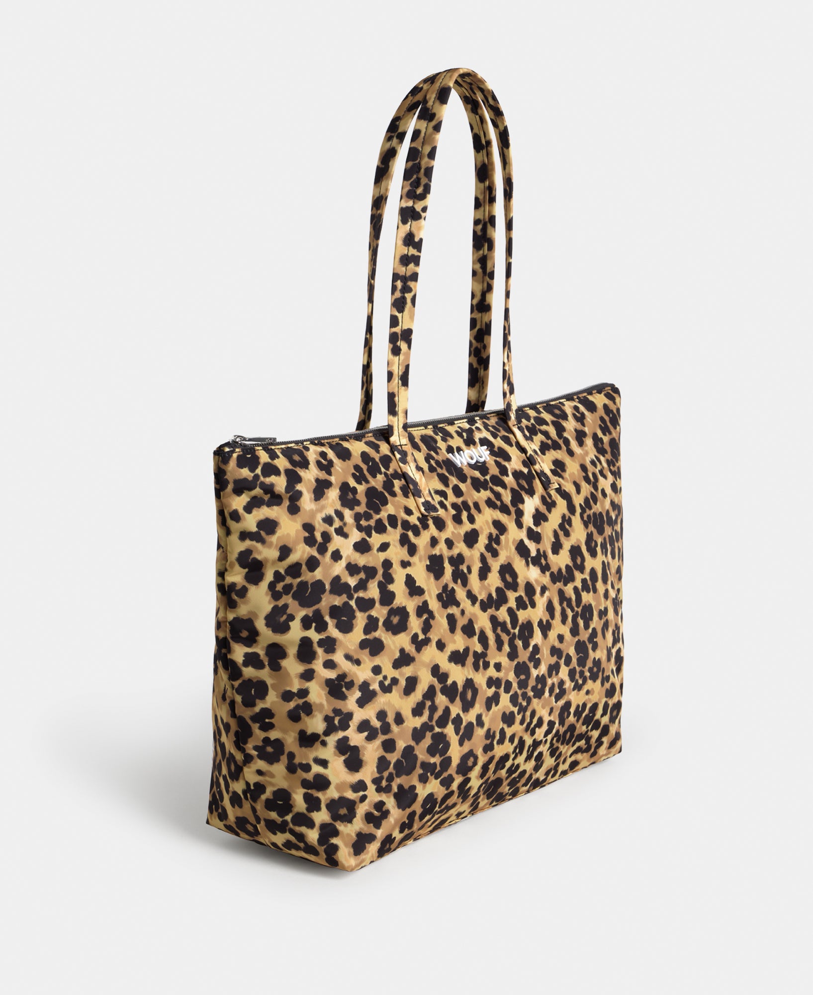 Side view of the shopper bag with animal print in brown and black tones - Wouf