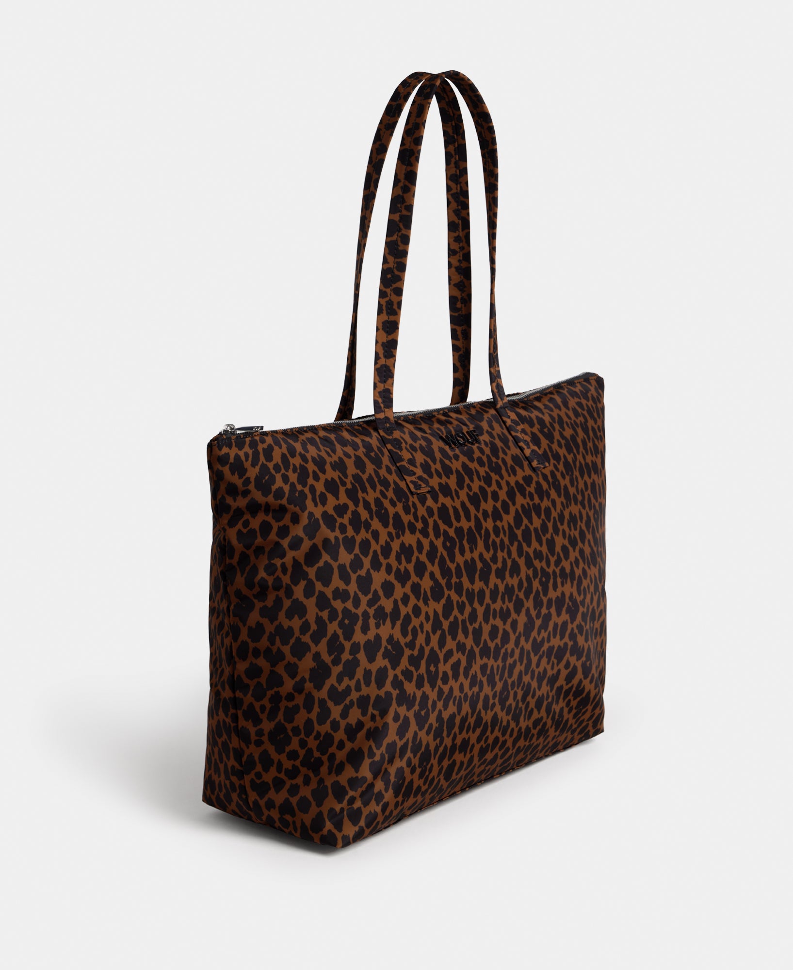 Side view of the shopper bag with animal print in brown and black tones - Wouf
