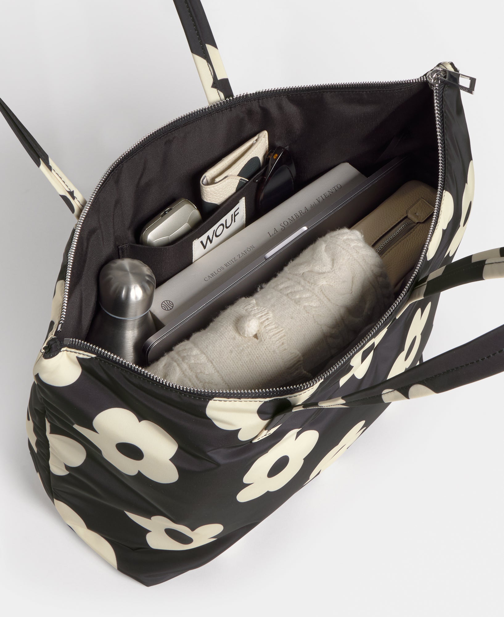 Interior of the shopper bag with white floral print on a black background - Wouf