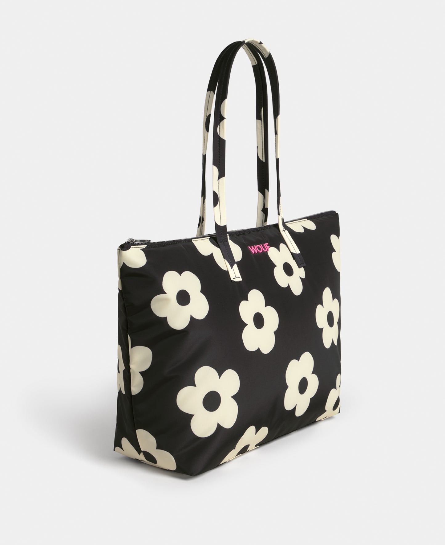 Side view of the shopper bag with white floral print on a black background - Wouf