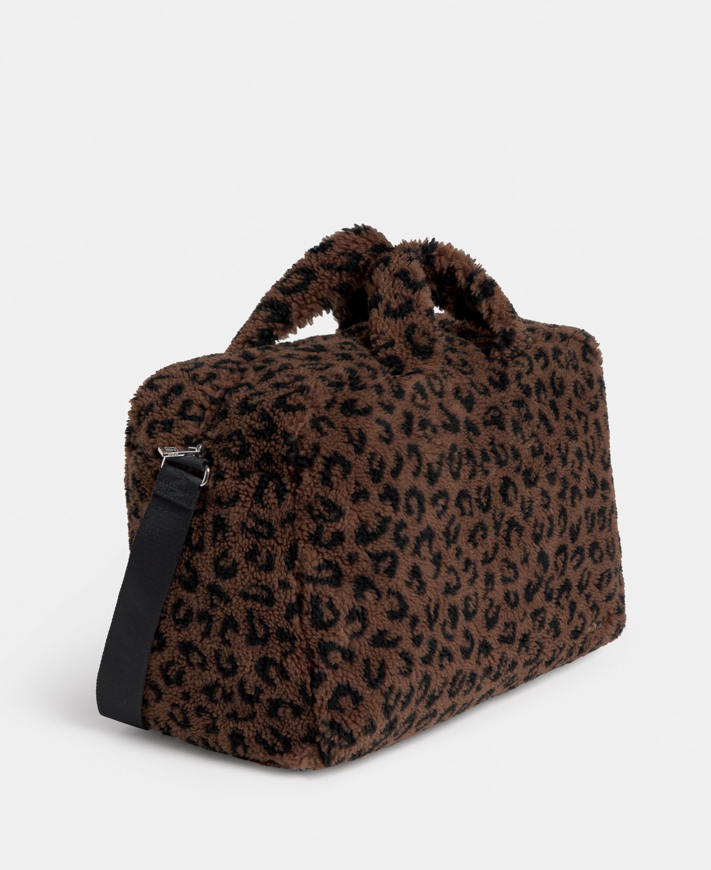 Side view of the weekend bag in teddy fabric with leopard print in brown and black tones - Wouf